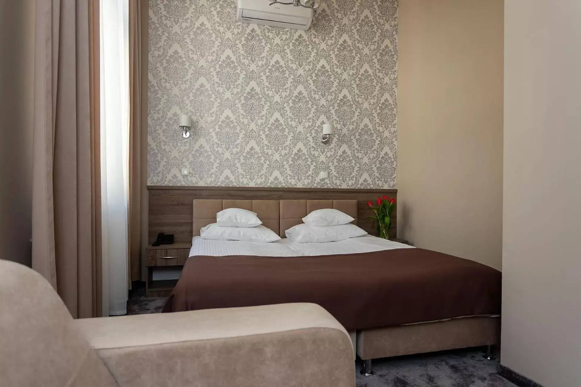 Bed in Hotel Maximum