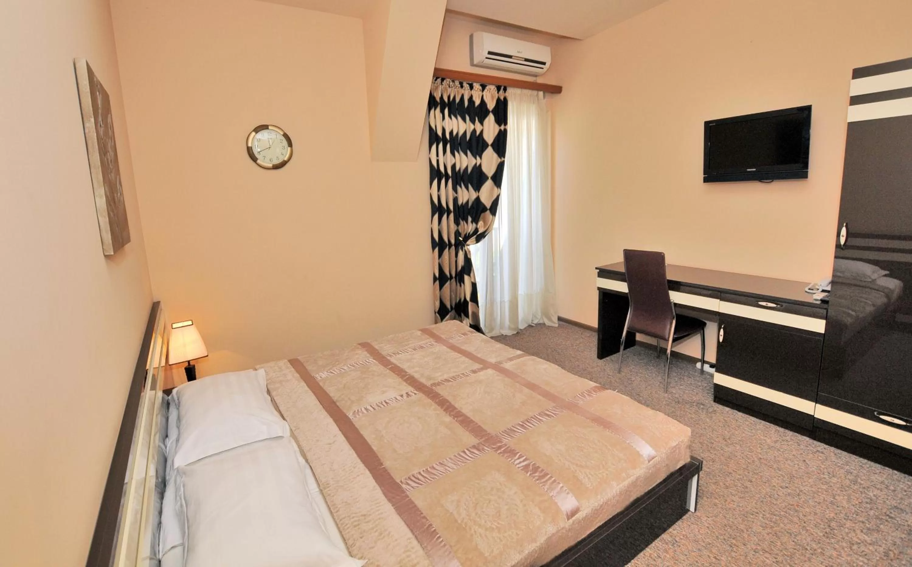 Bed in Hotel Diplomat