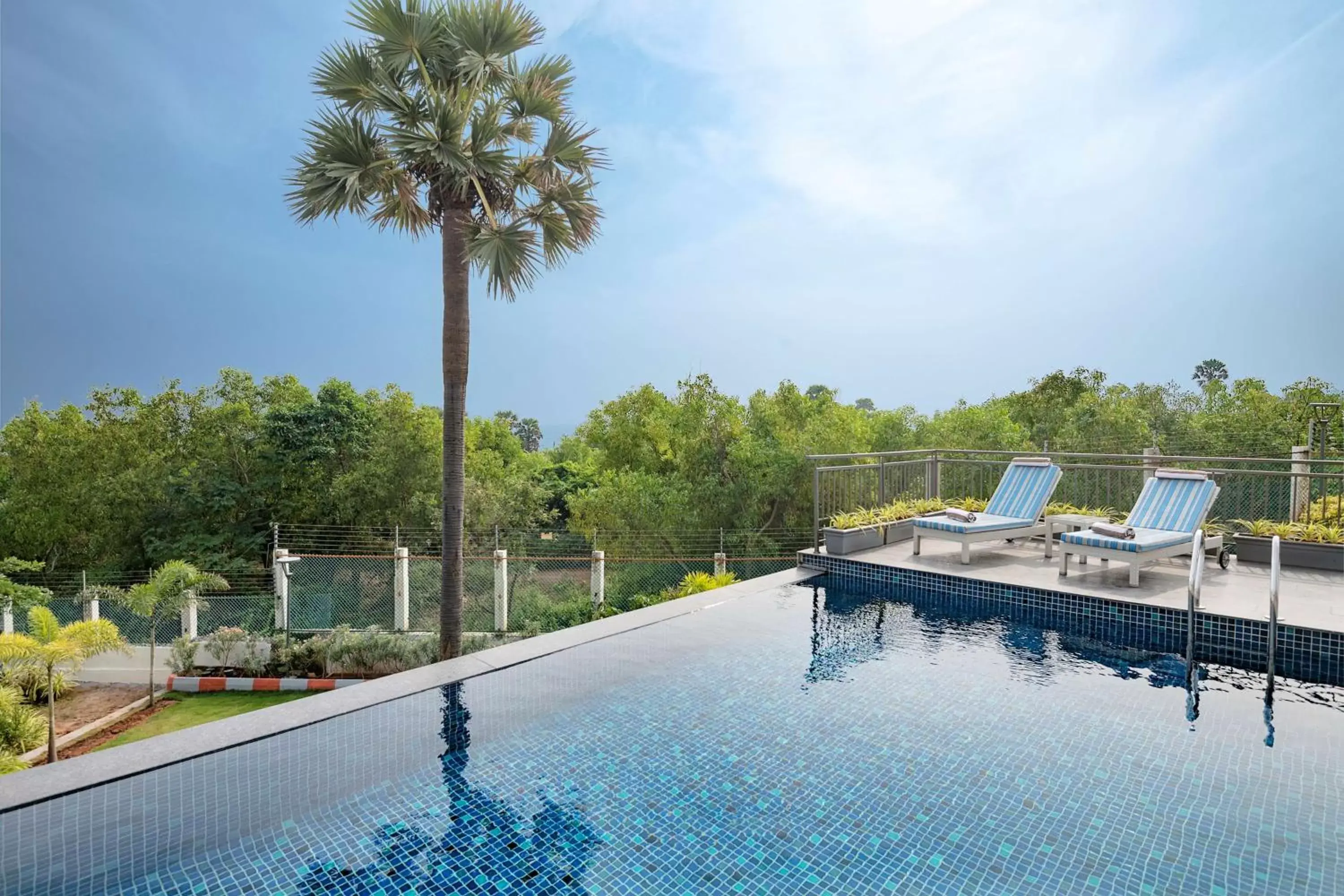 Photo of the whole room, Swimming Pool in Radisson Blu Resort Visakhapatnam