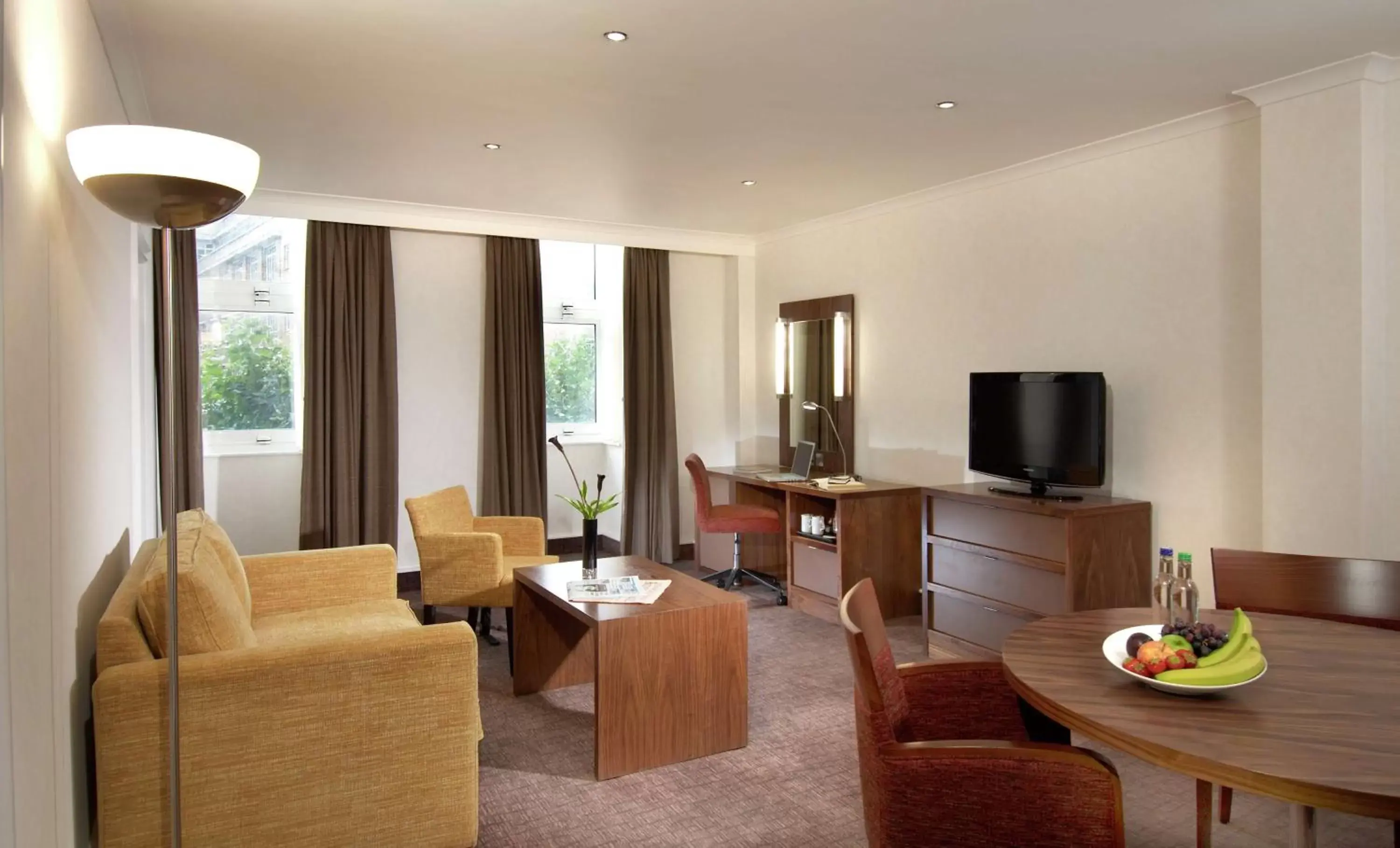 Living room, Seating Area in Hilton London Olympia