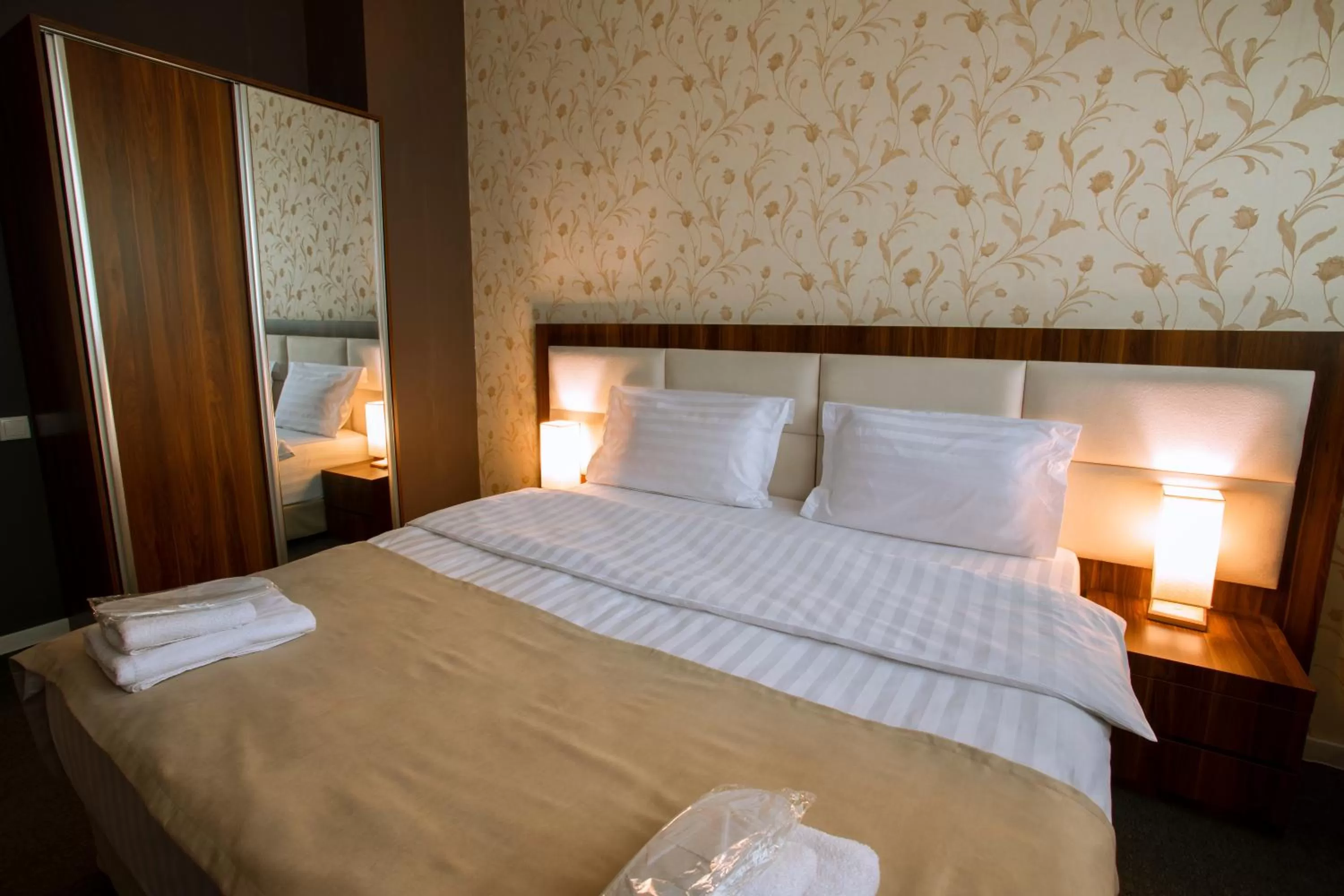 Bed in Apart Hotel West