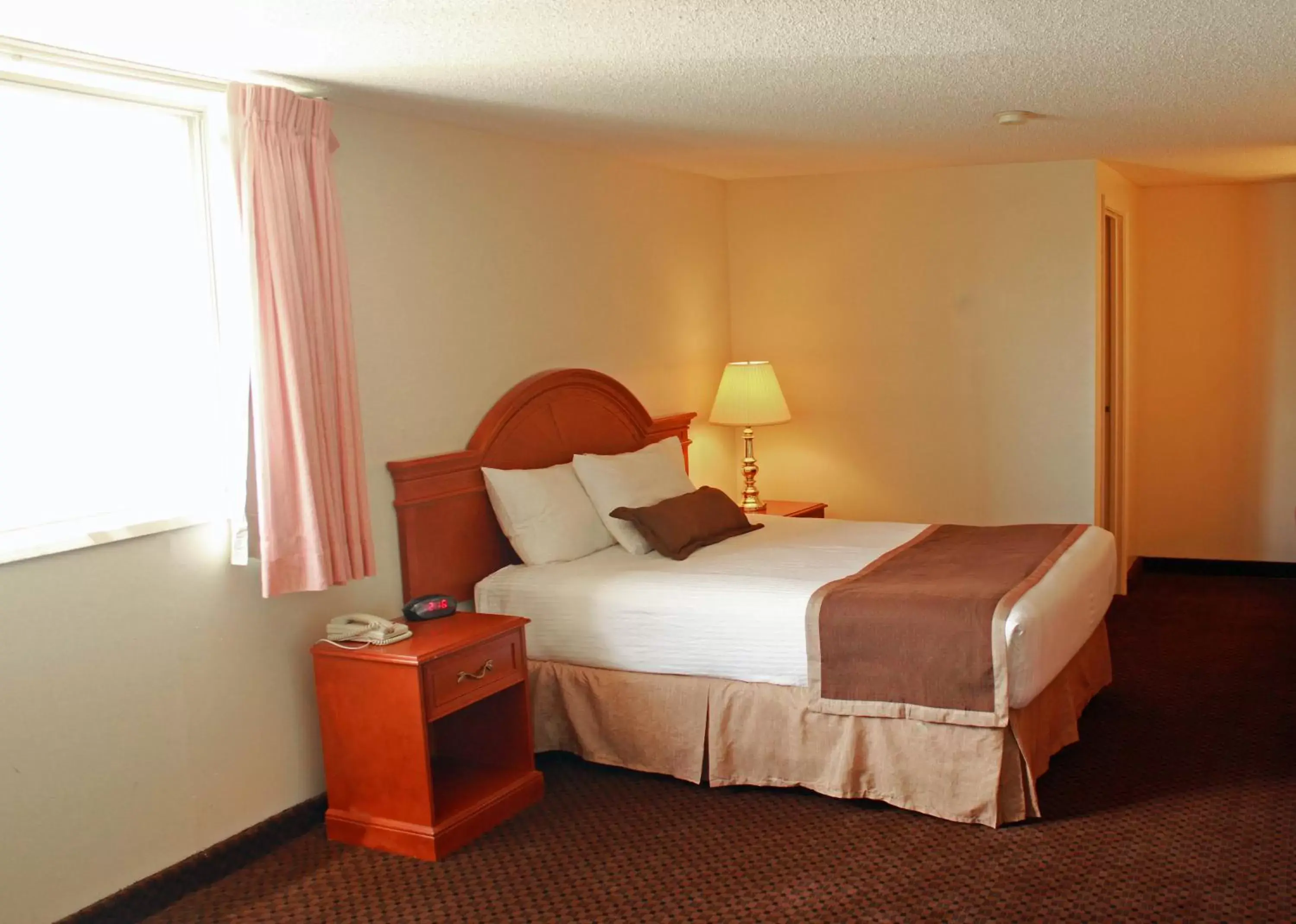 Bed in Ramada by Wyndham Medicine Hat