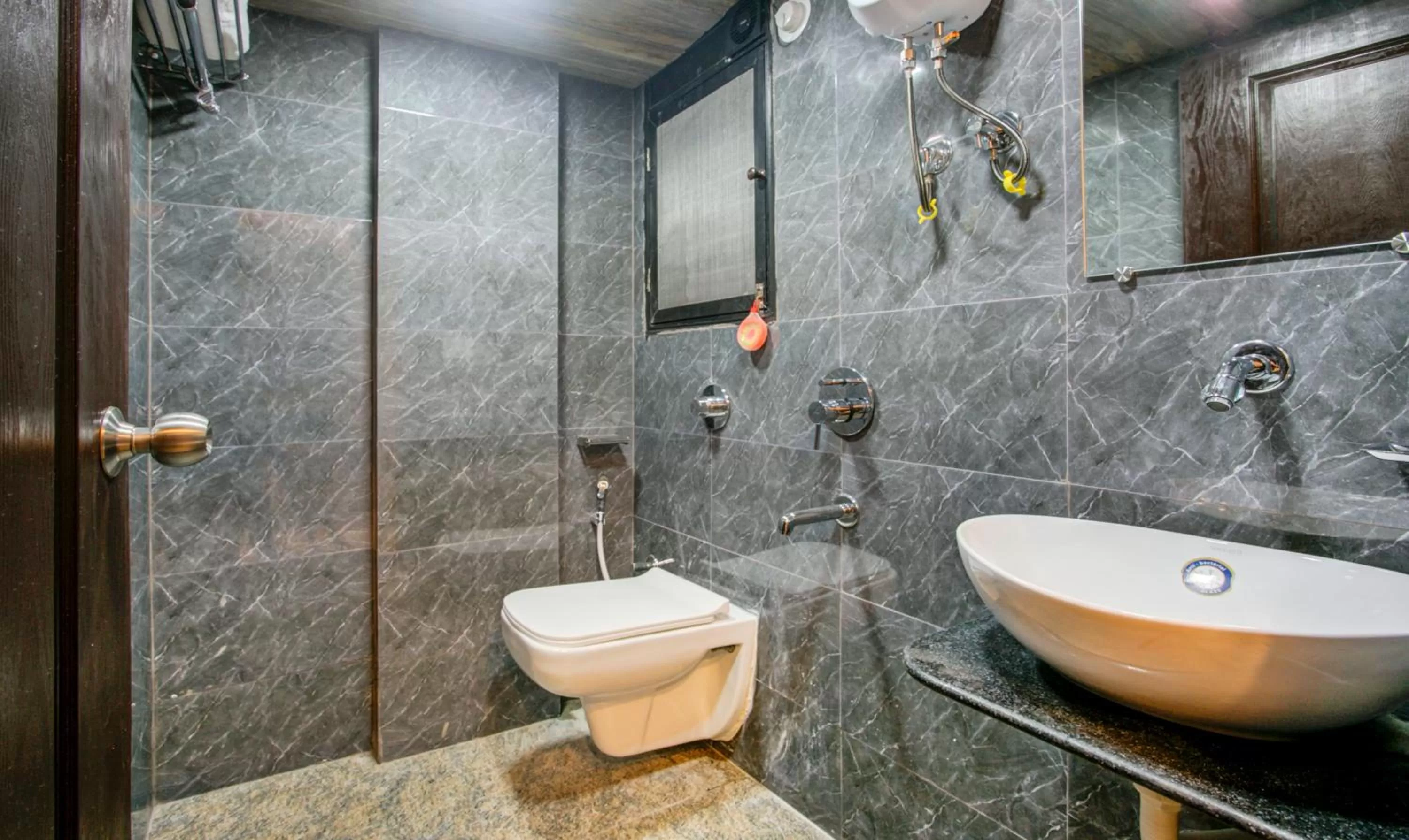 Toilet in Treebo Kings Inn Vashi