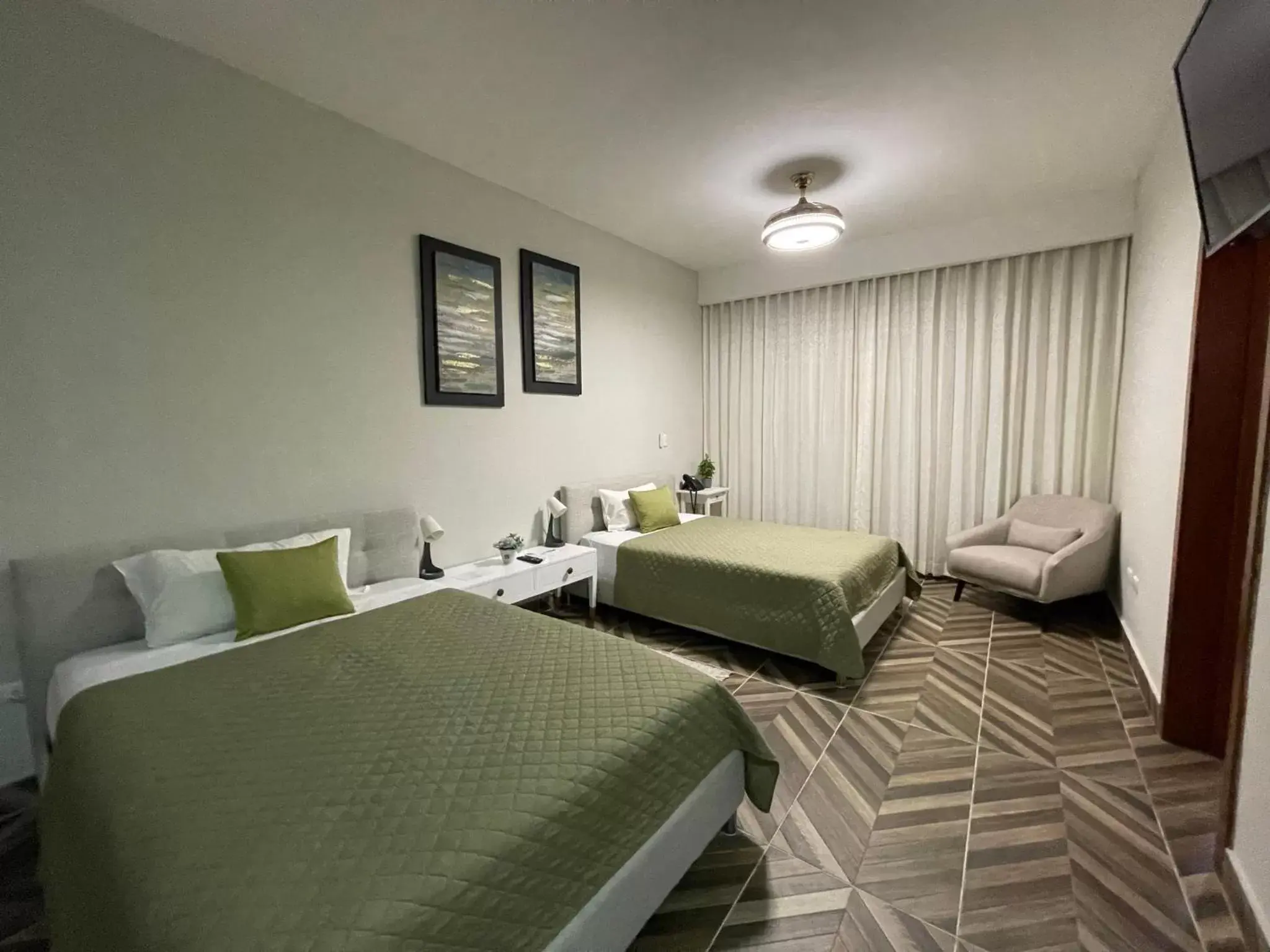 Bed in Hotel Monarca