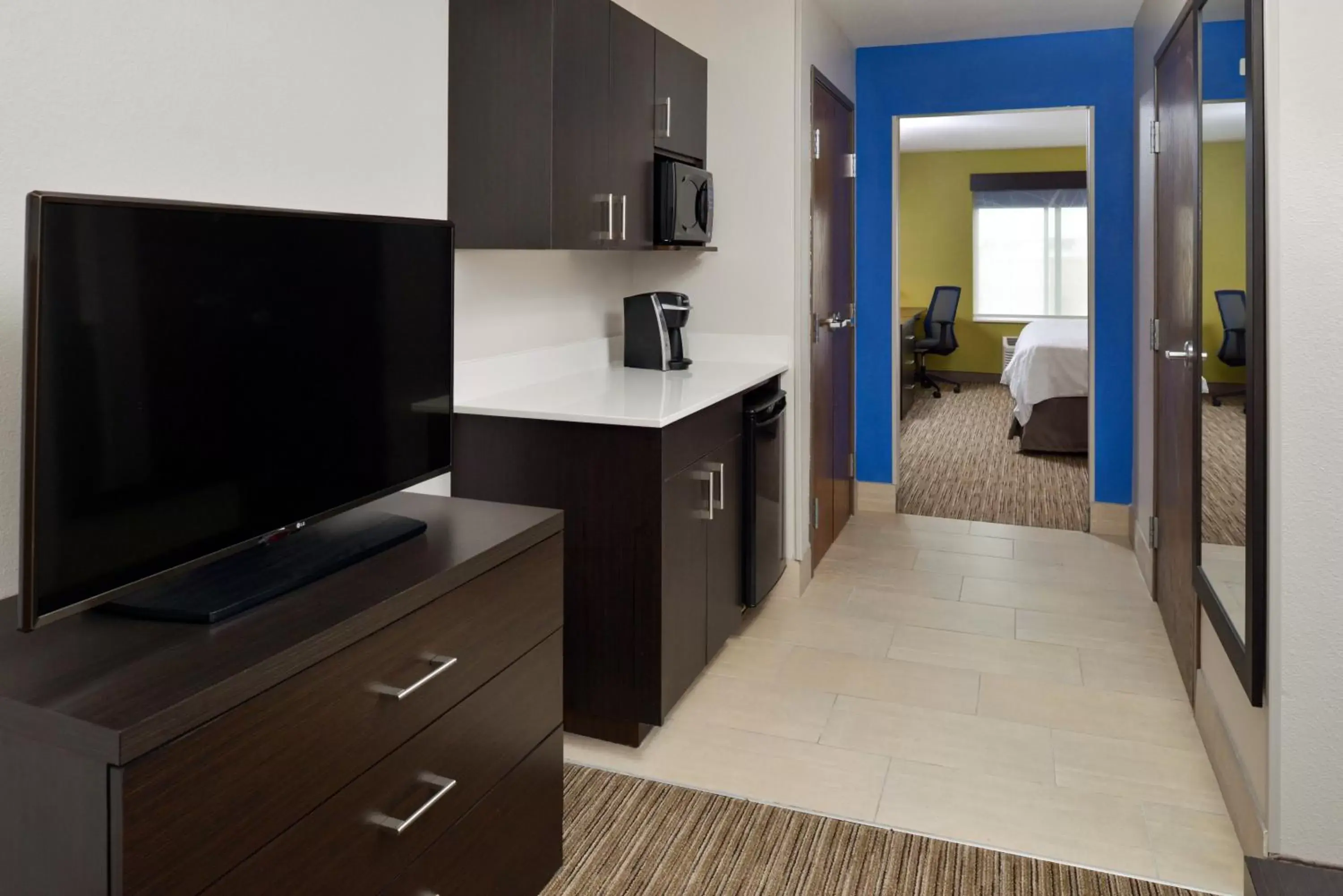 Photo of the whole room, TV/Entertainment Center in Holiday Inn Express & Suites Pueblo, an IHG Hotel