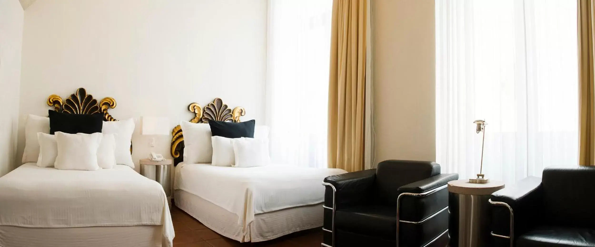 Bed in Hotel Herencia By Hosting House