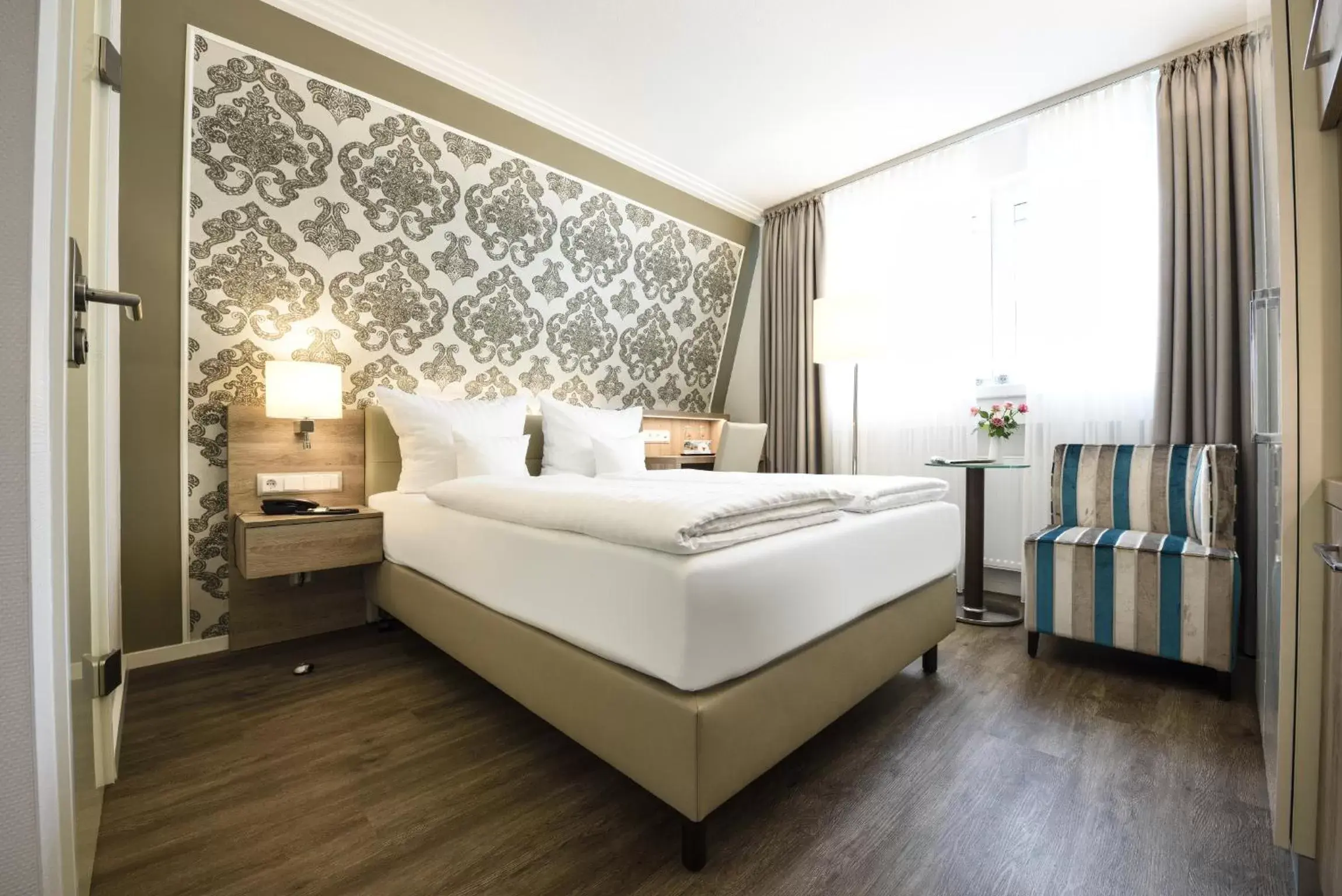 Photo of the whole room, Bed in See + Sporthotel Ankum