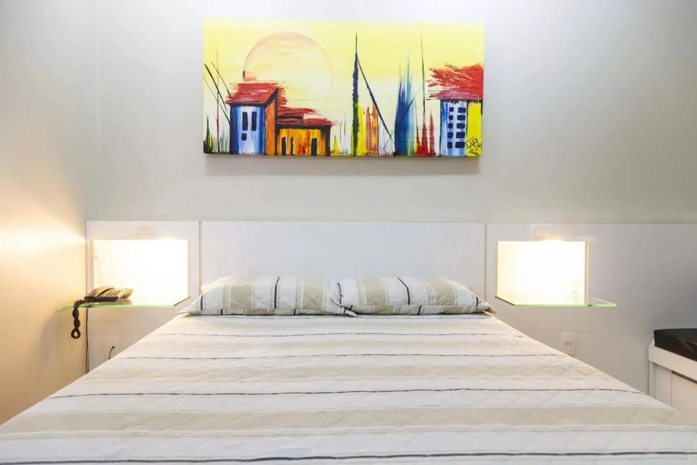 Bed in VOA Plazza Hotel Bed in VOA Plazza Hotel