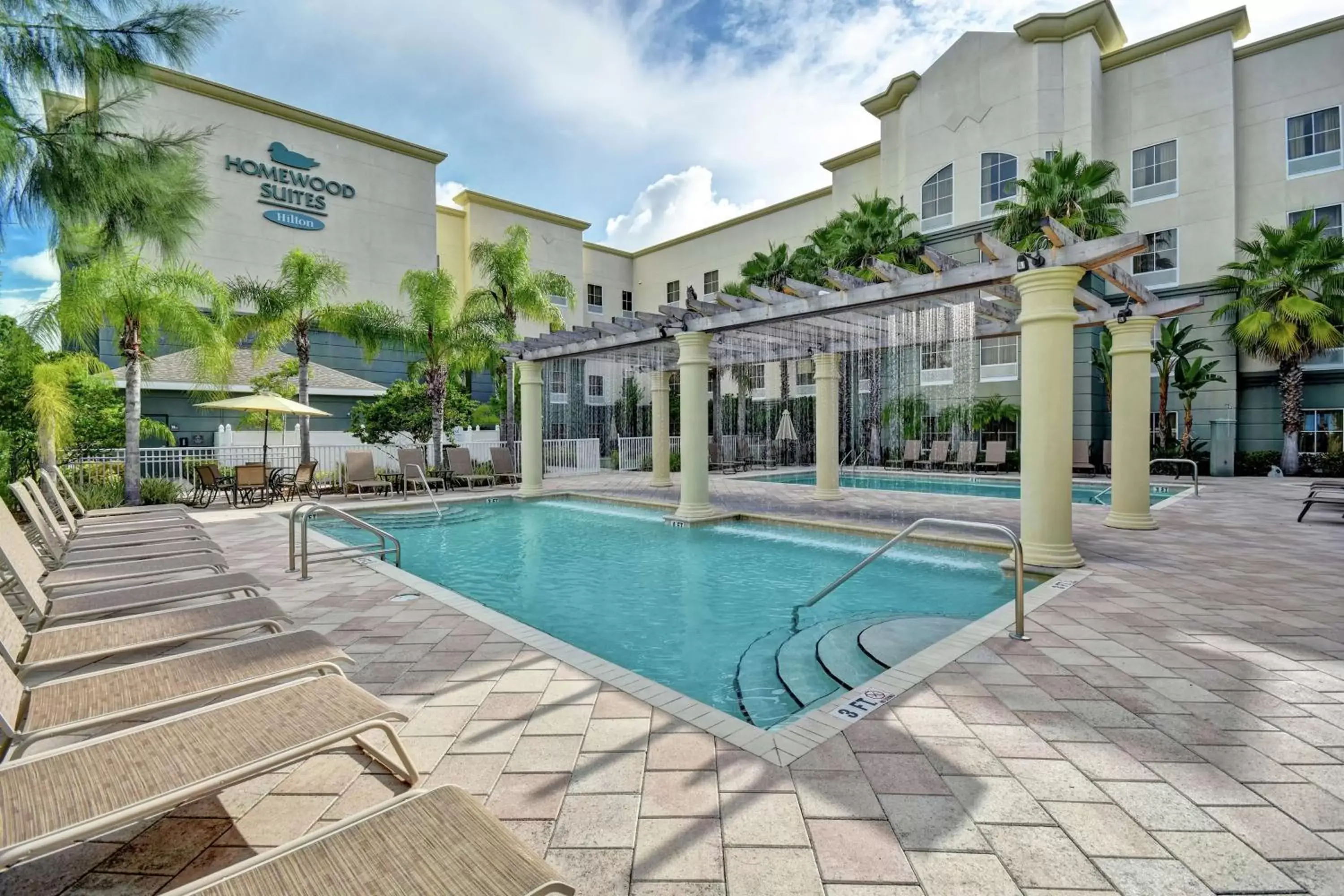 Property building, Swimming Pool in Homewood Suites by Hilton Tampa-Port Richey