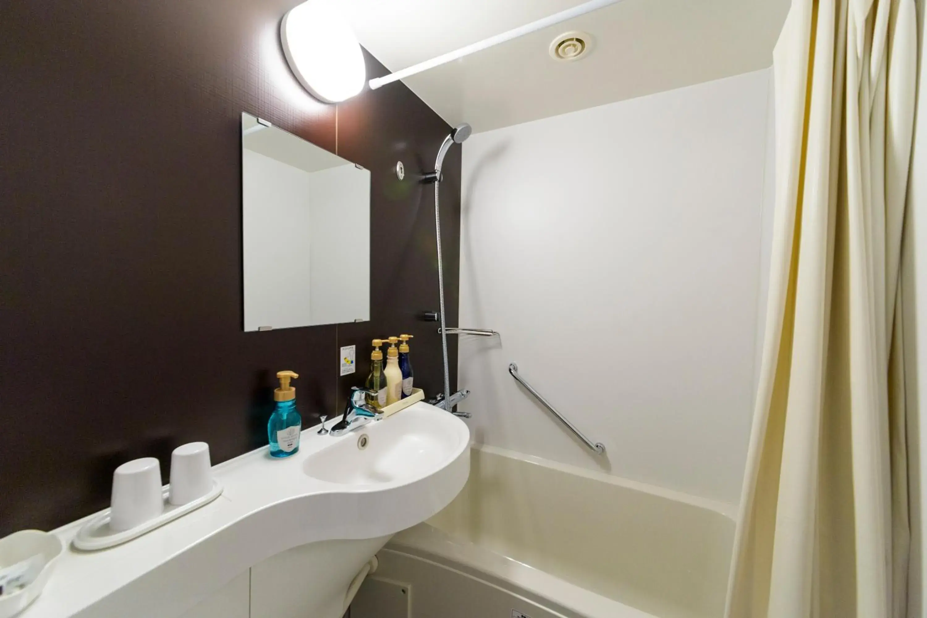 Bathroom in SureStay Plus Hotel by Best Western Shin-Osaka