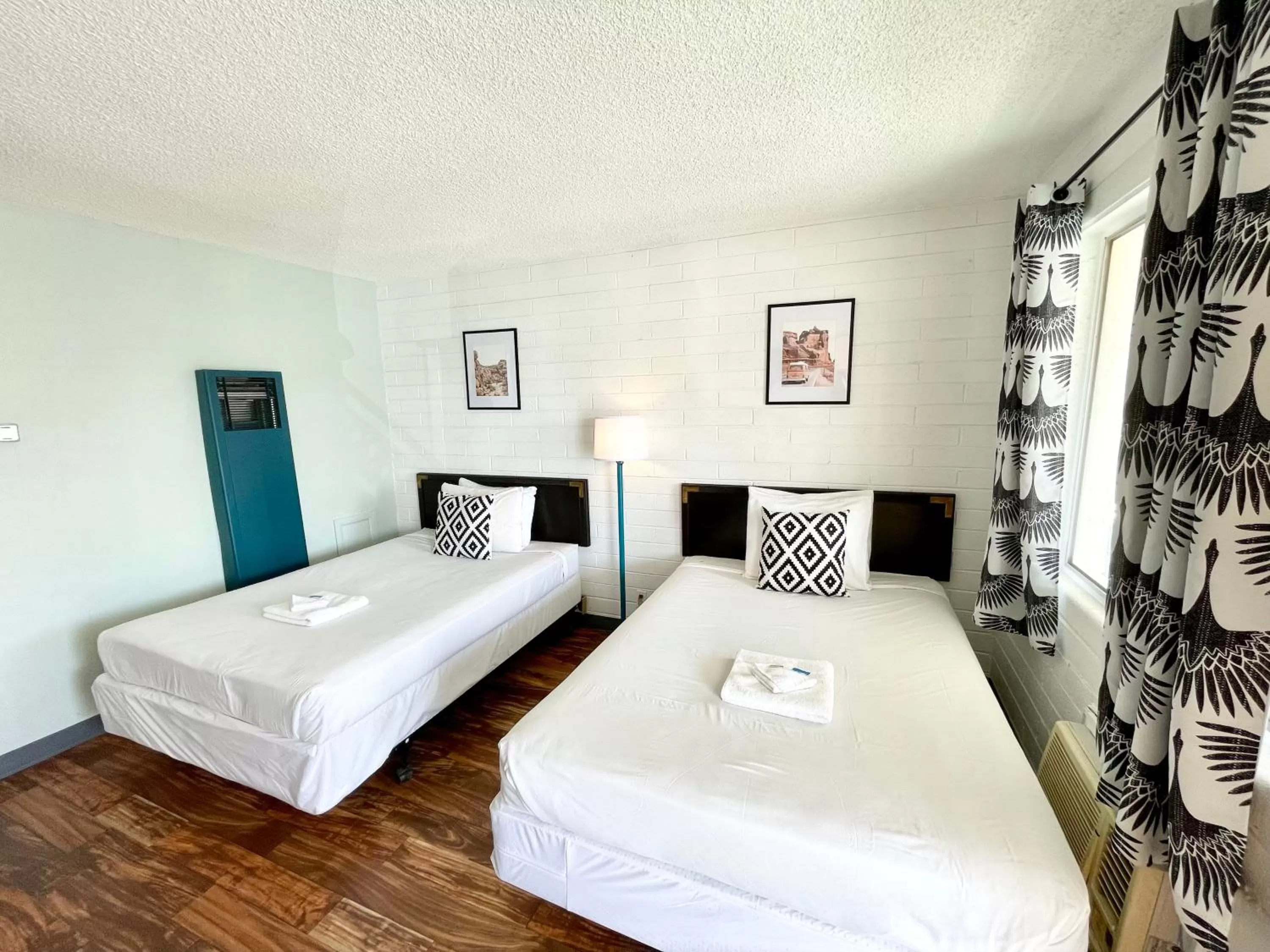 Bed in The Postcard Motel