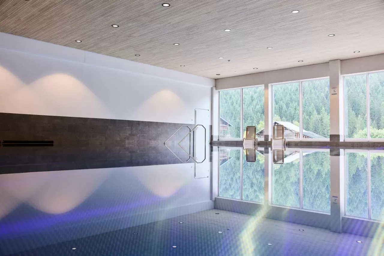 Swimming Pool in Aparthotel Kleinwalsertal
