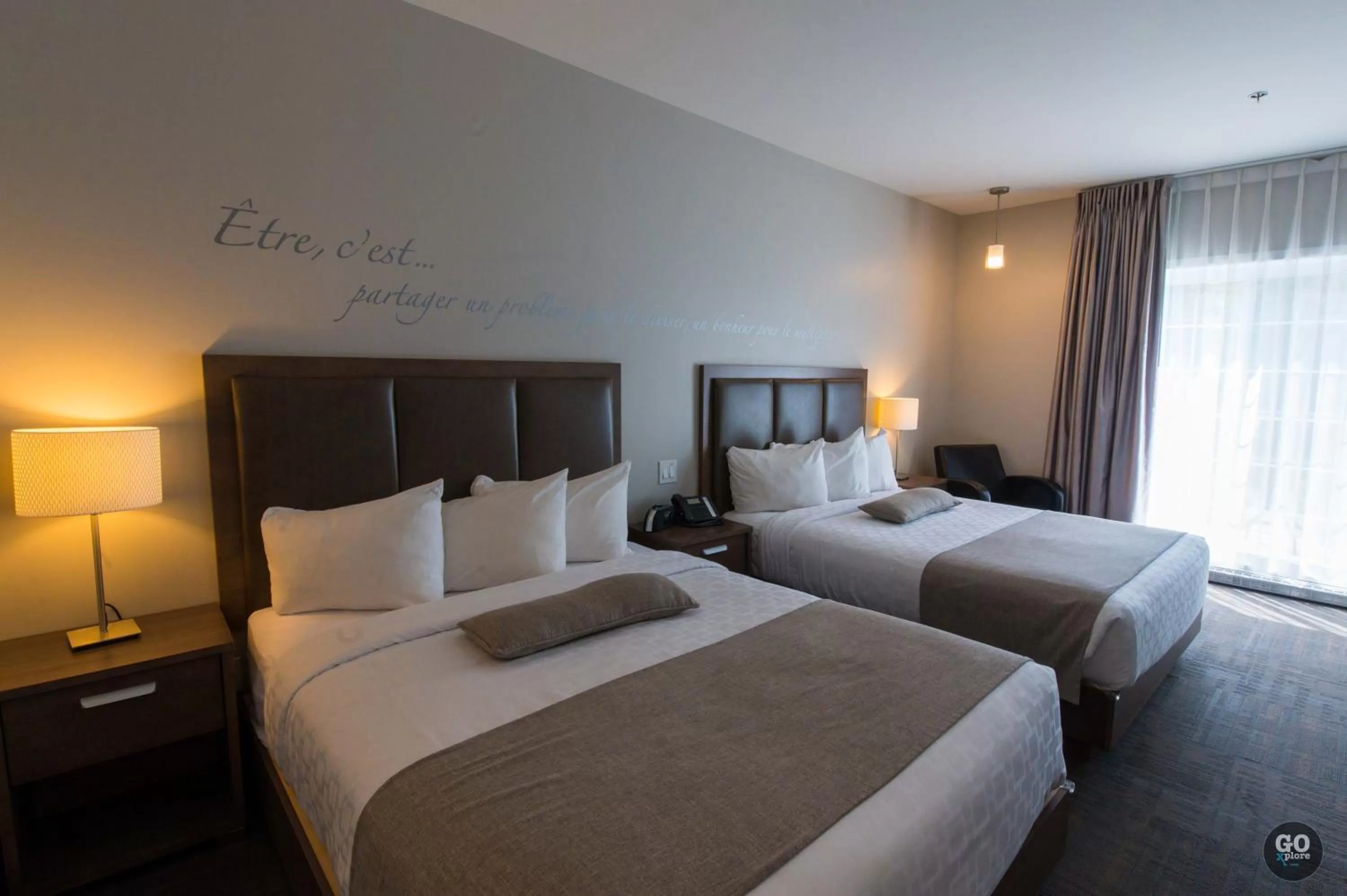 Bed in Hôtel et Pavillons Le Petit Manoir du Casino