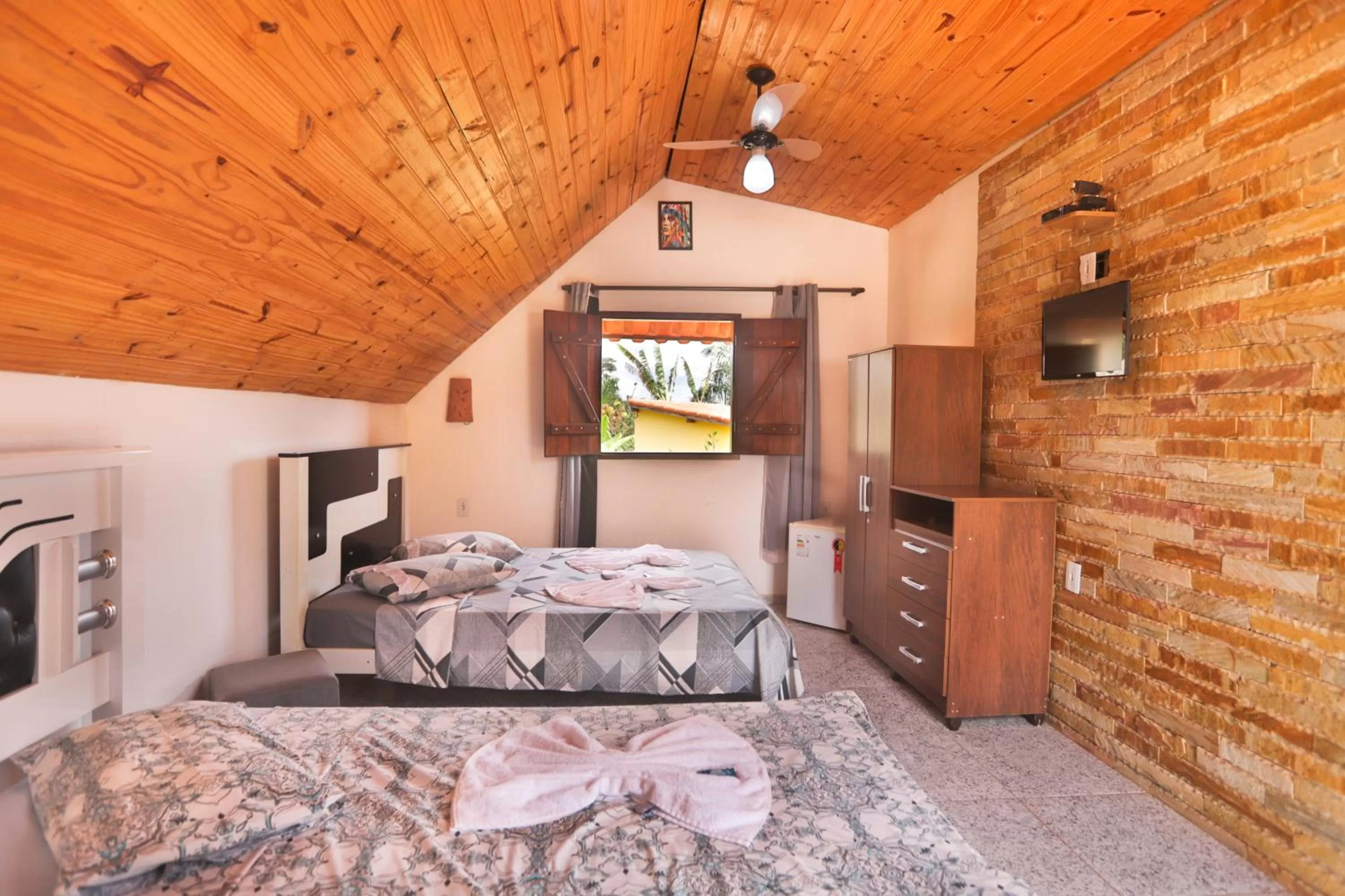 Bed in Pousada e Chales Por do Sol