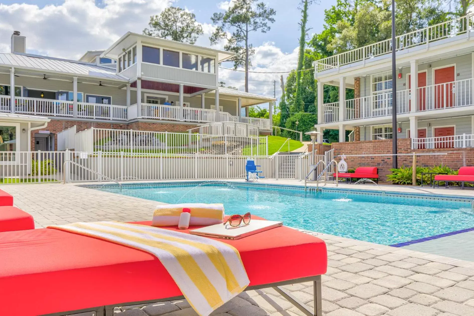 Property building, Swimming Pool in Seven Hills Suites Tallahassee