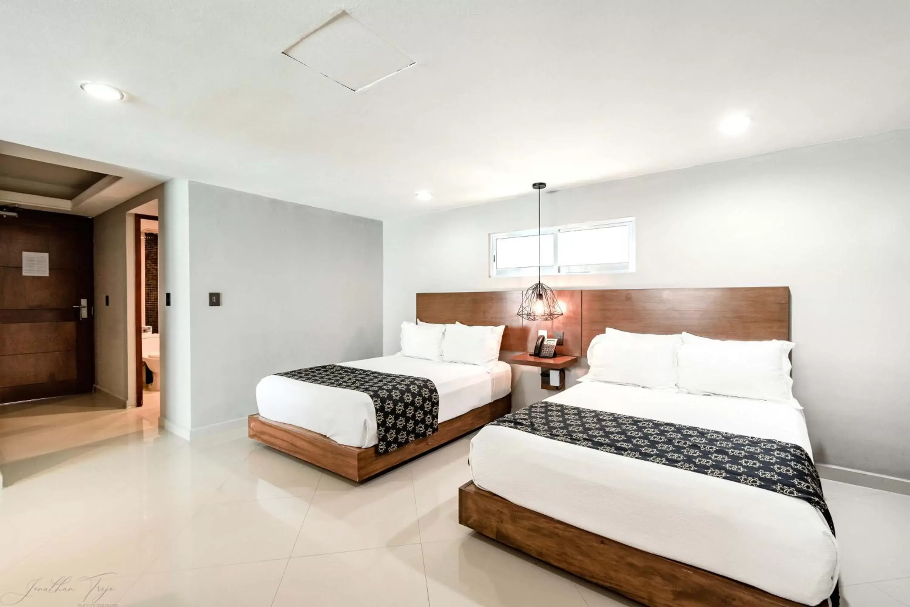 Bed in Ocean Dream Cancun by GuruHotel