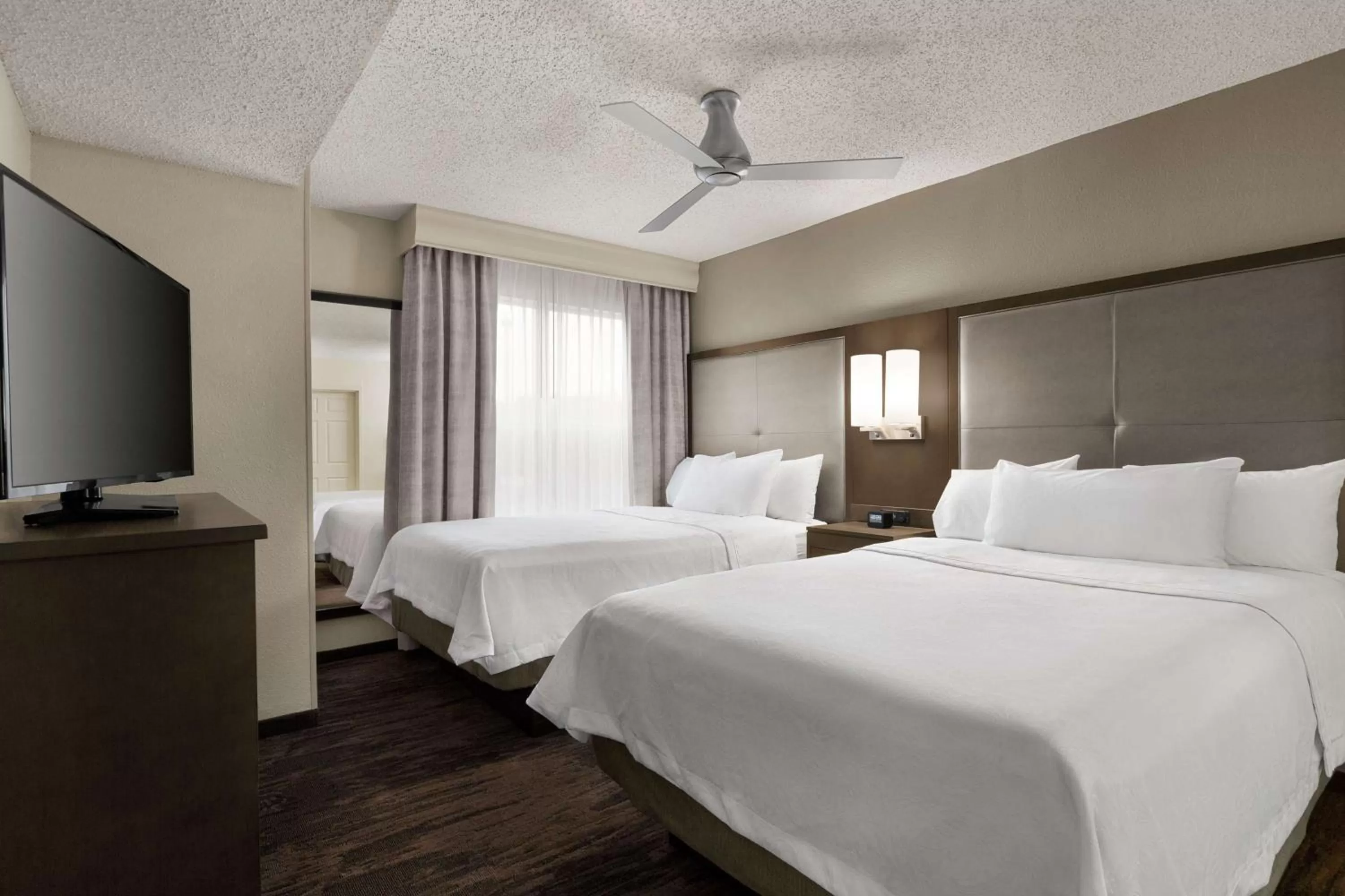 Bed in Homewood Suites by Hilton Dallas-Plano