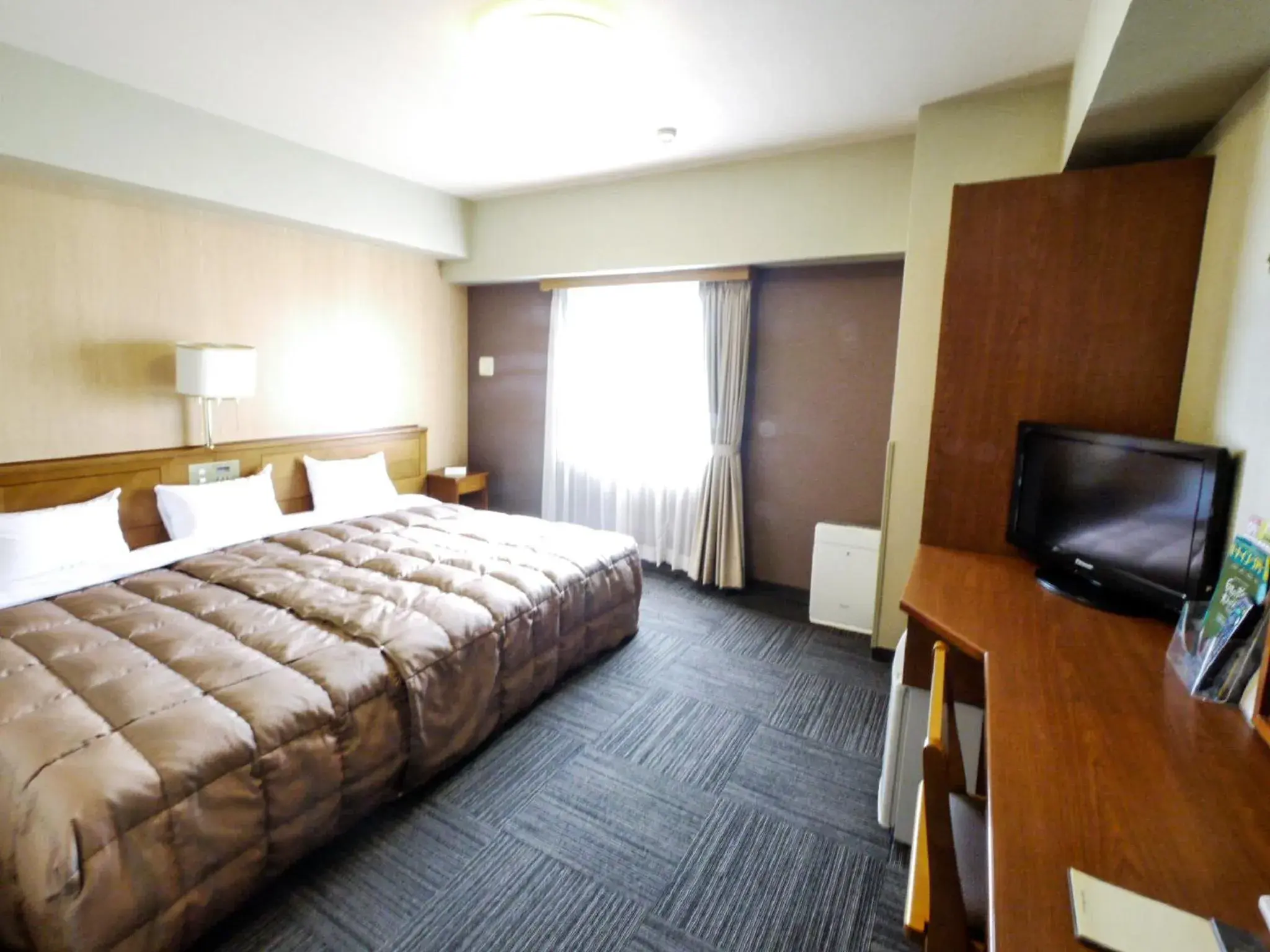 Photo of the whole room, Bed in Hotel Route Inn Hamanako