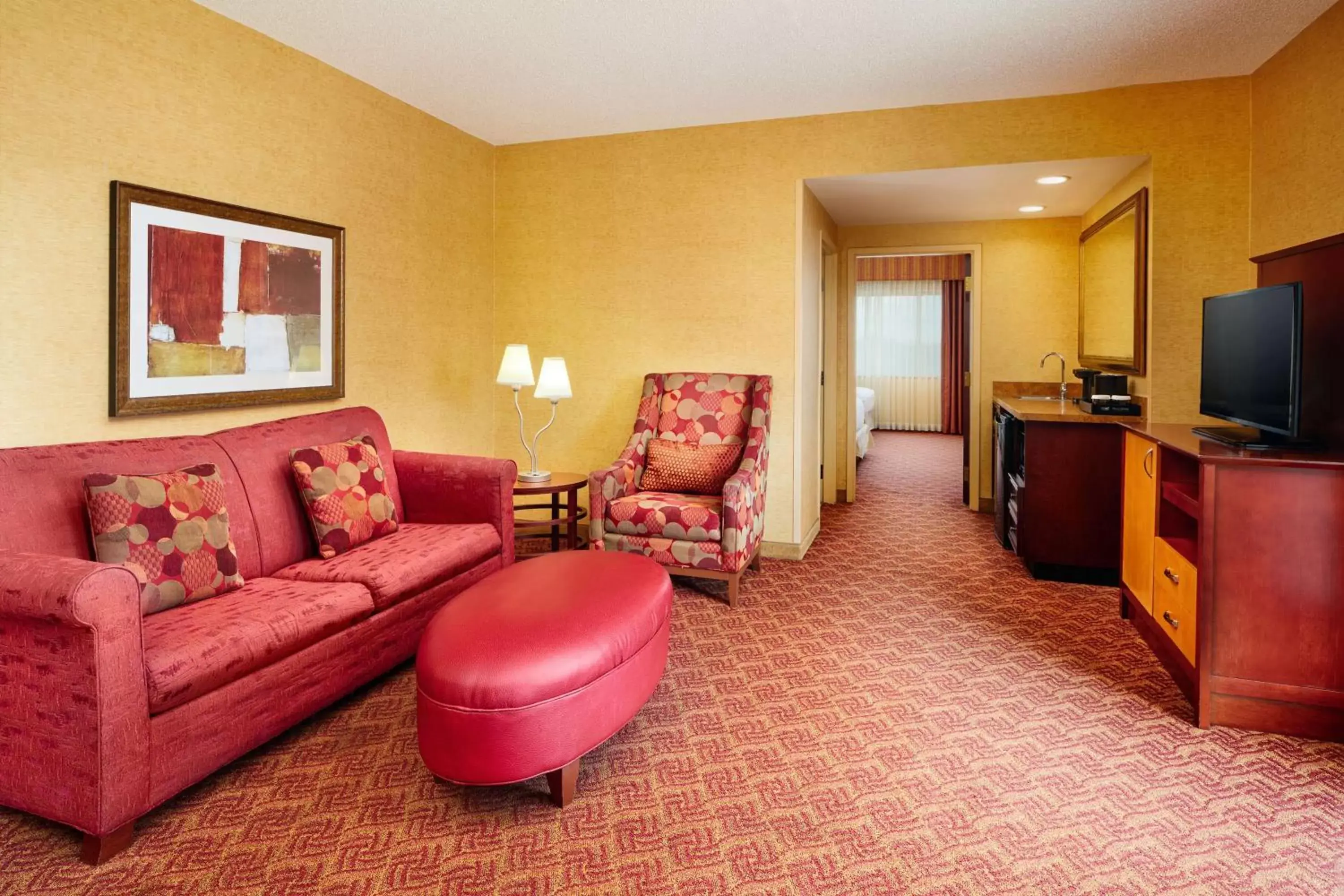 Living room, Seating Area in Embassy Suites by Hilton Charlotte Concord Golf Resort & Spa
