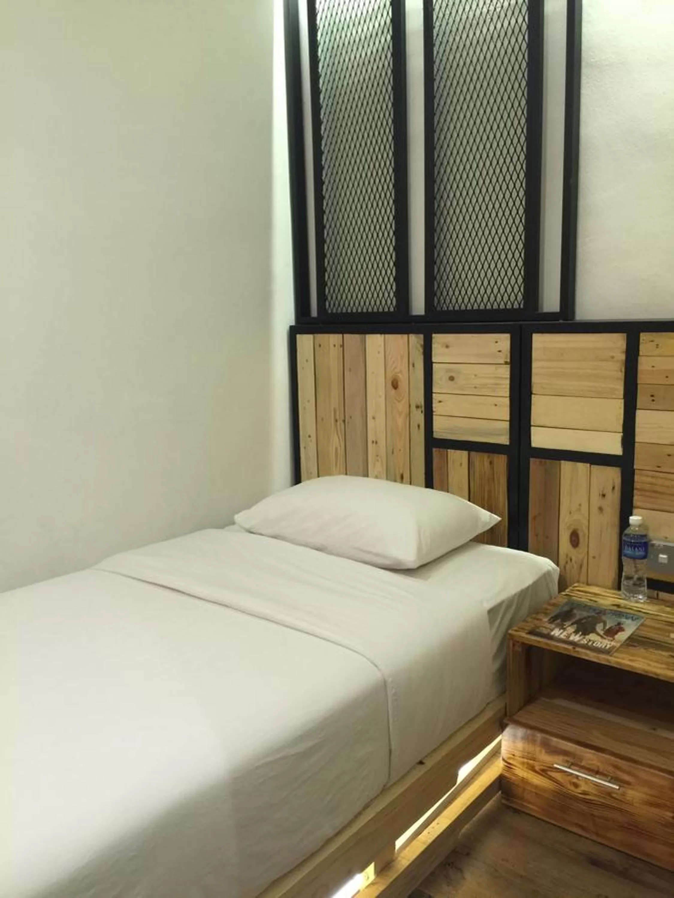 Bed in The Oikos Hotel