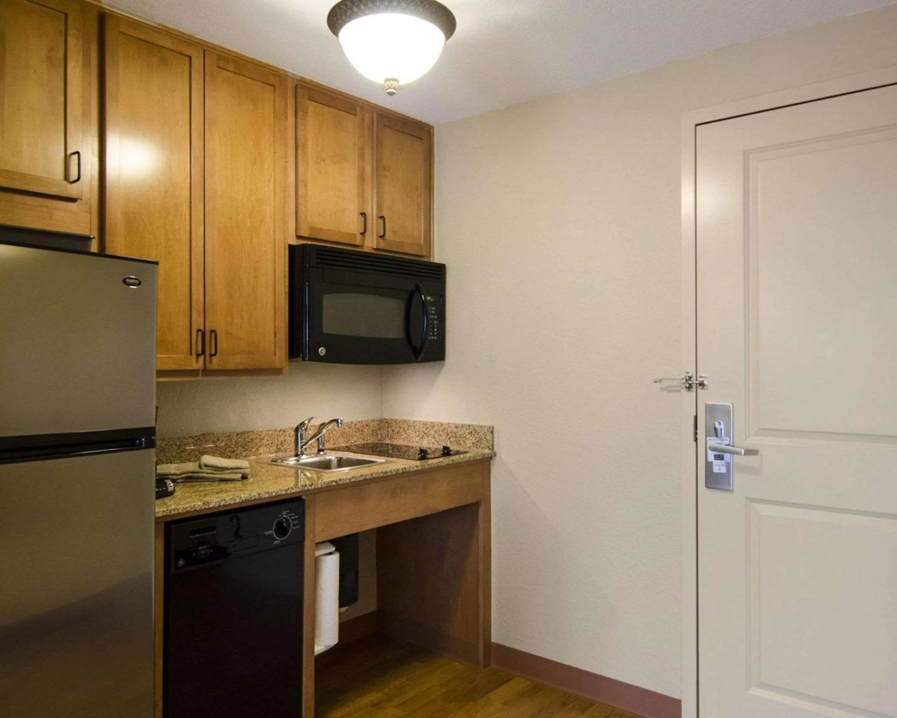 Photo of the whole room in Affordable Suites of America Rogers - Bentonville