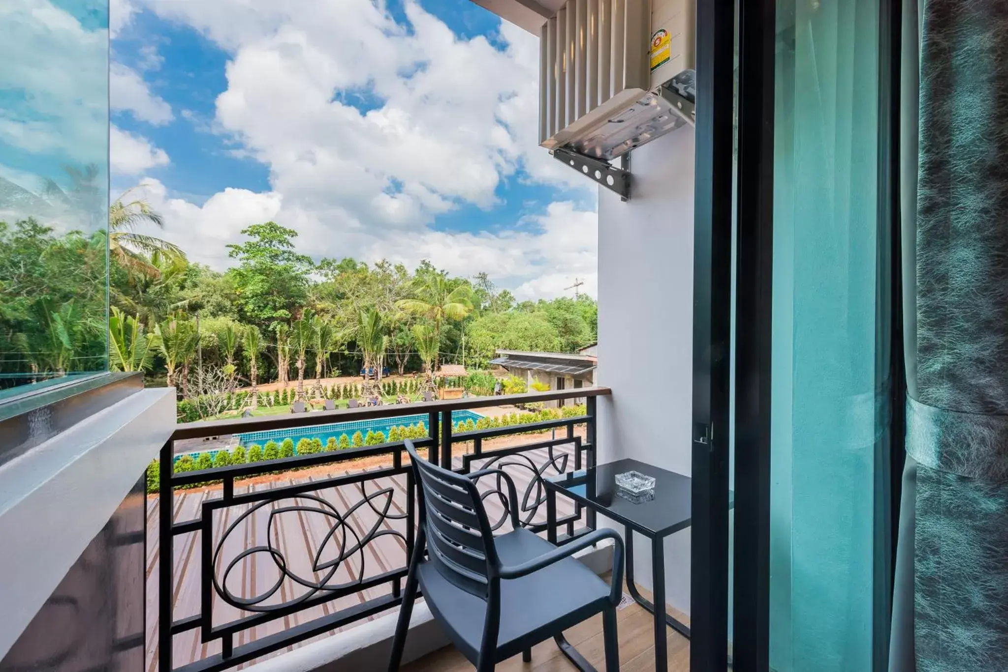 Pool view, Balcony/Terrace in River Front Krabi Hotel