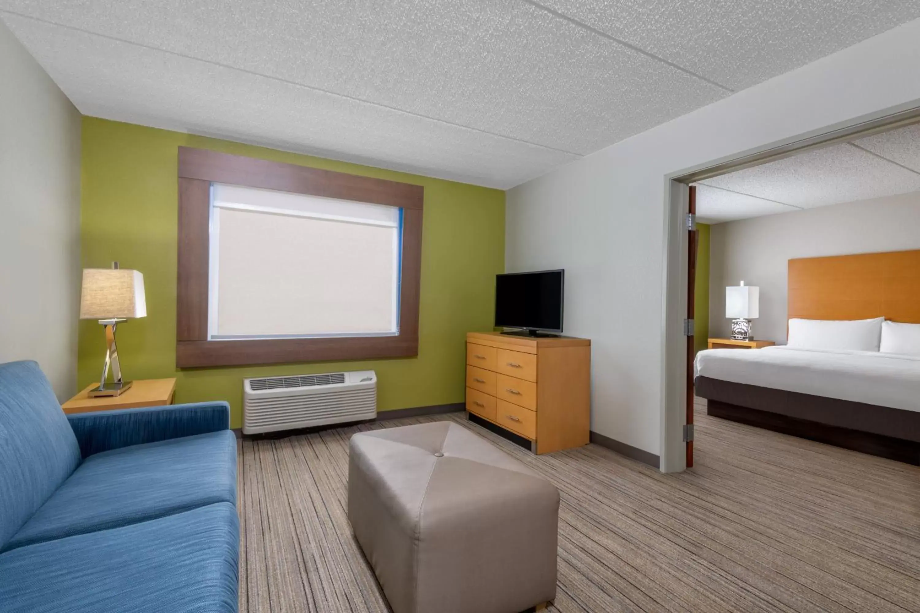 Photo of the whole room, TV/Entertainment Center in Holiday Inn Express & Suites Wheat Ridge-Denver West, an IHG Hotel