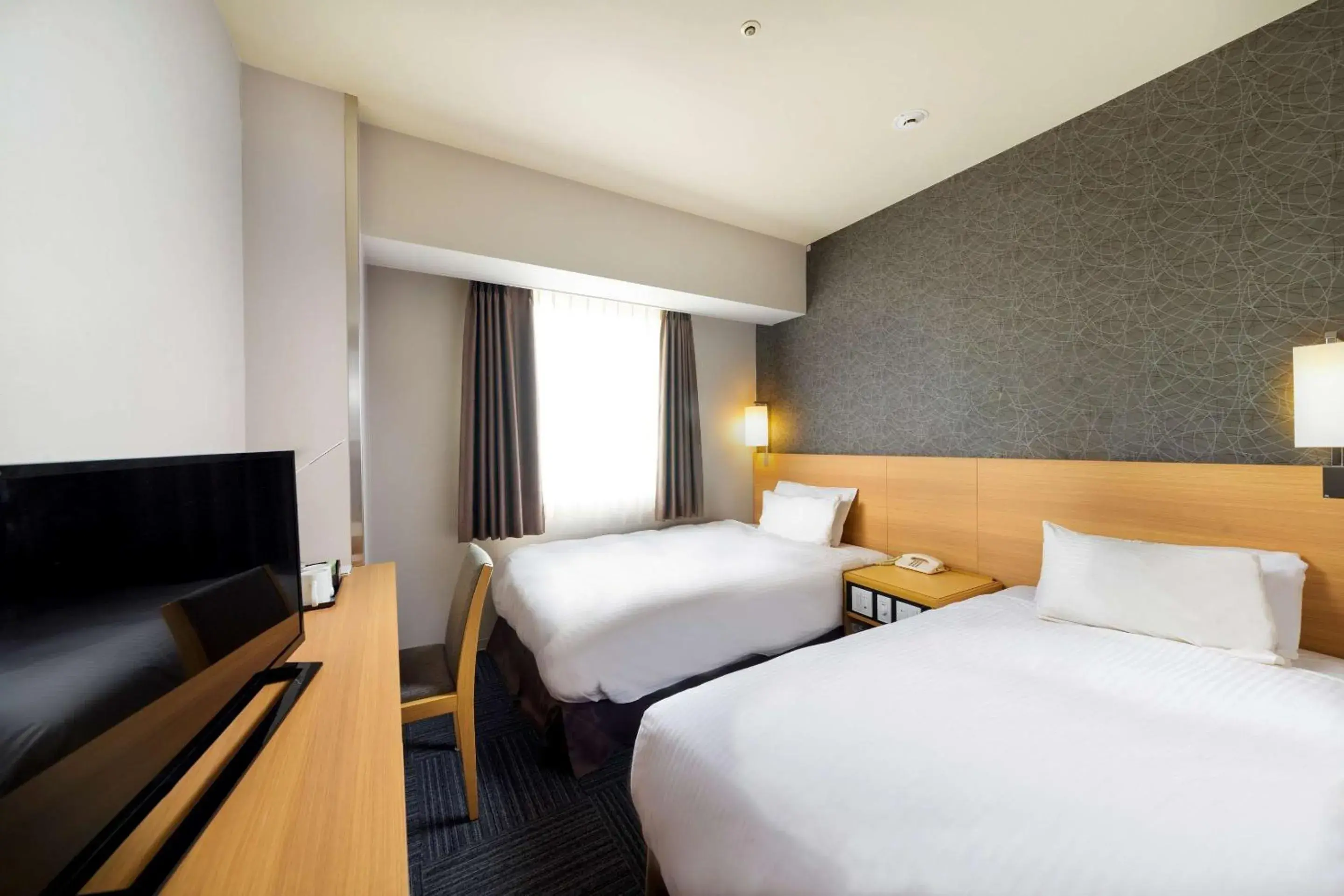 Bedroom in SureStay Plus Hotel by Best Western Shin-Osaka Bedroom in SureStay Plus Hotel by Best Western Shin-Osaka