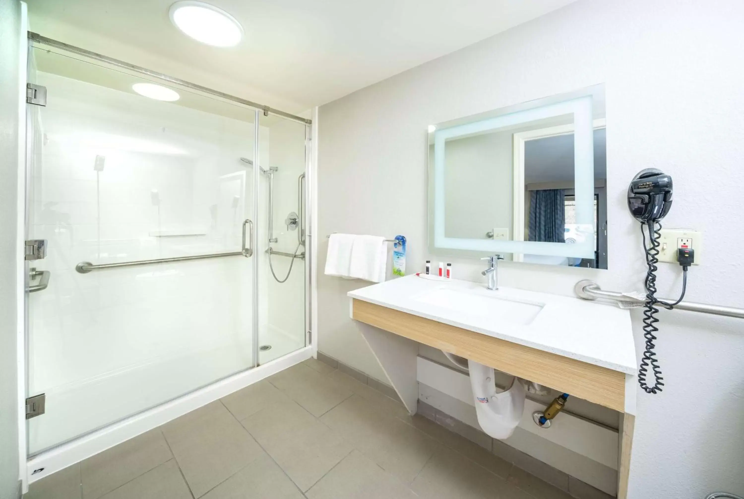 Bathroom in Days Inn by Wyndham Atlanta Stone Mountain