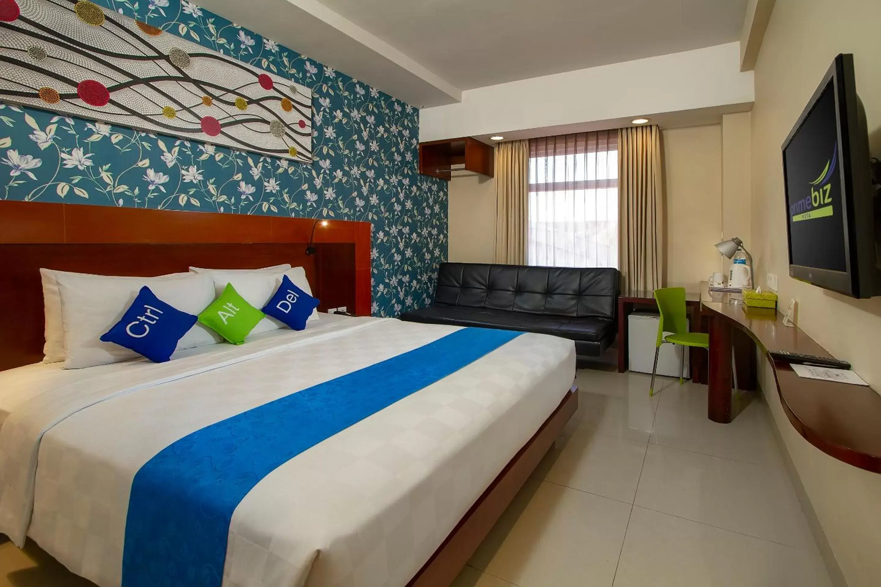 Bedroom, Bed in PrimeBiz Hotel Kuta