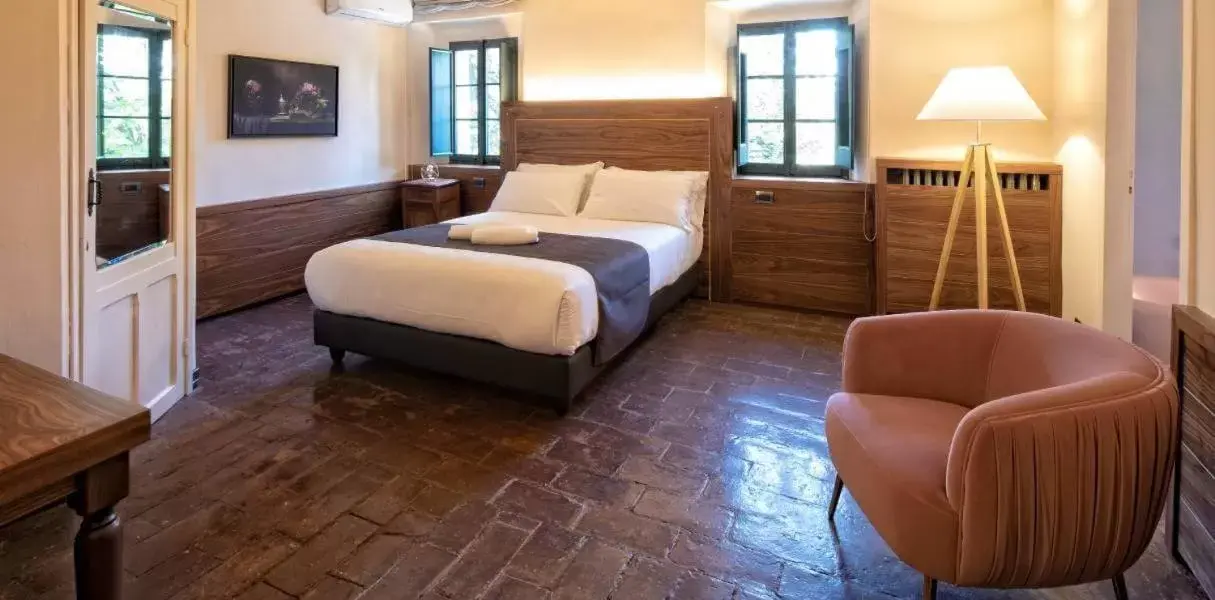 Bed in La Loggia Historic Resort