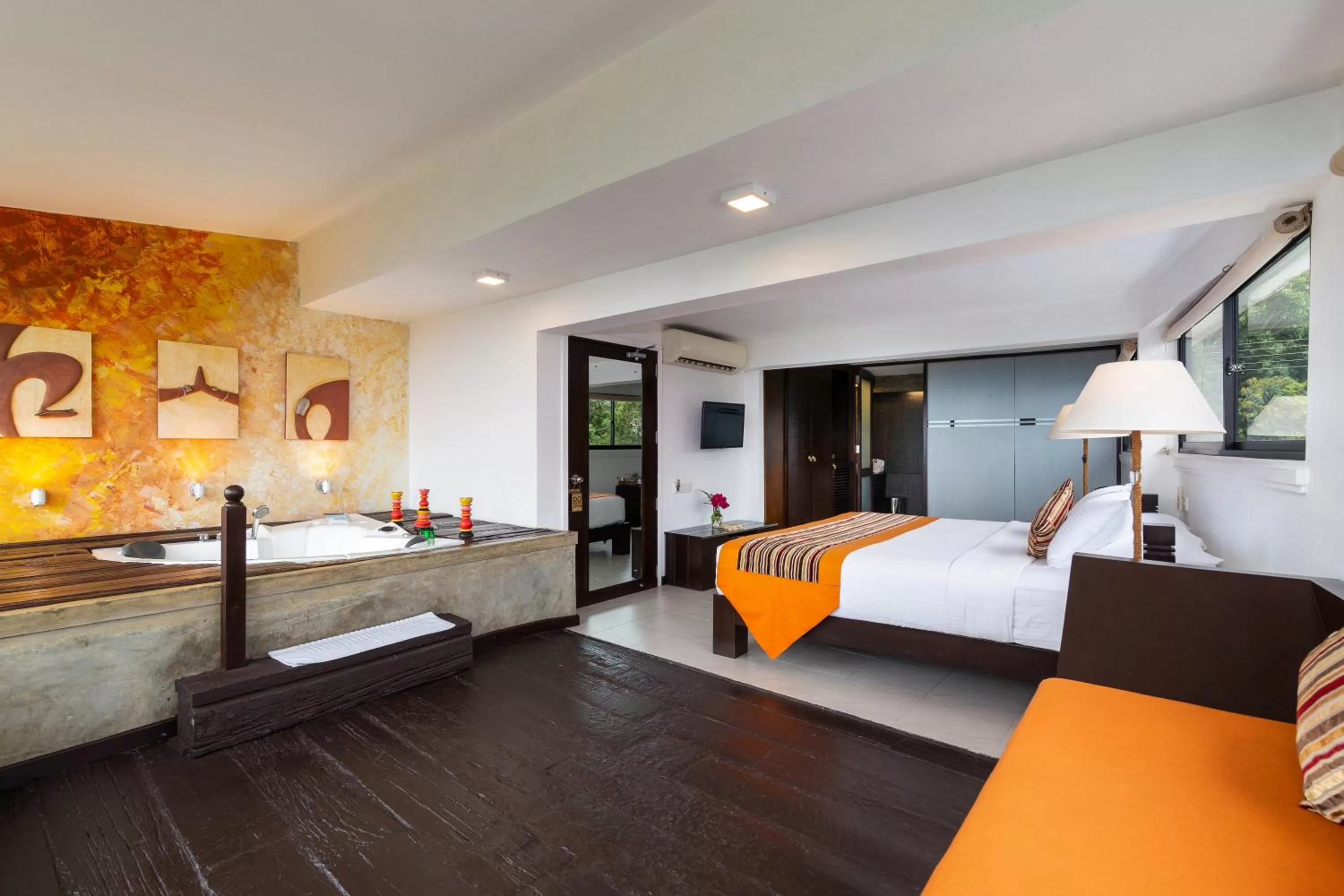 Photo of the whole room, Bed in The Theva Residency