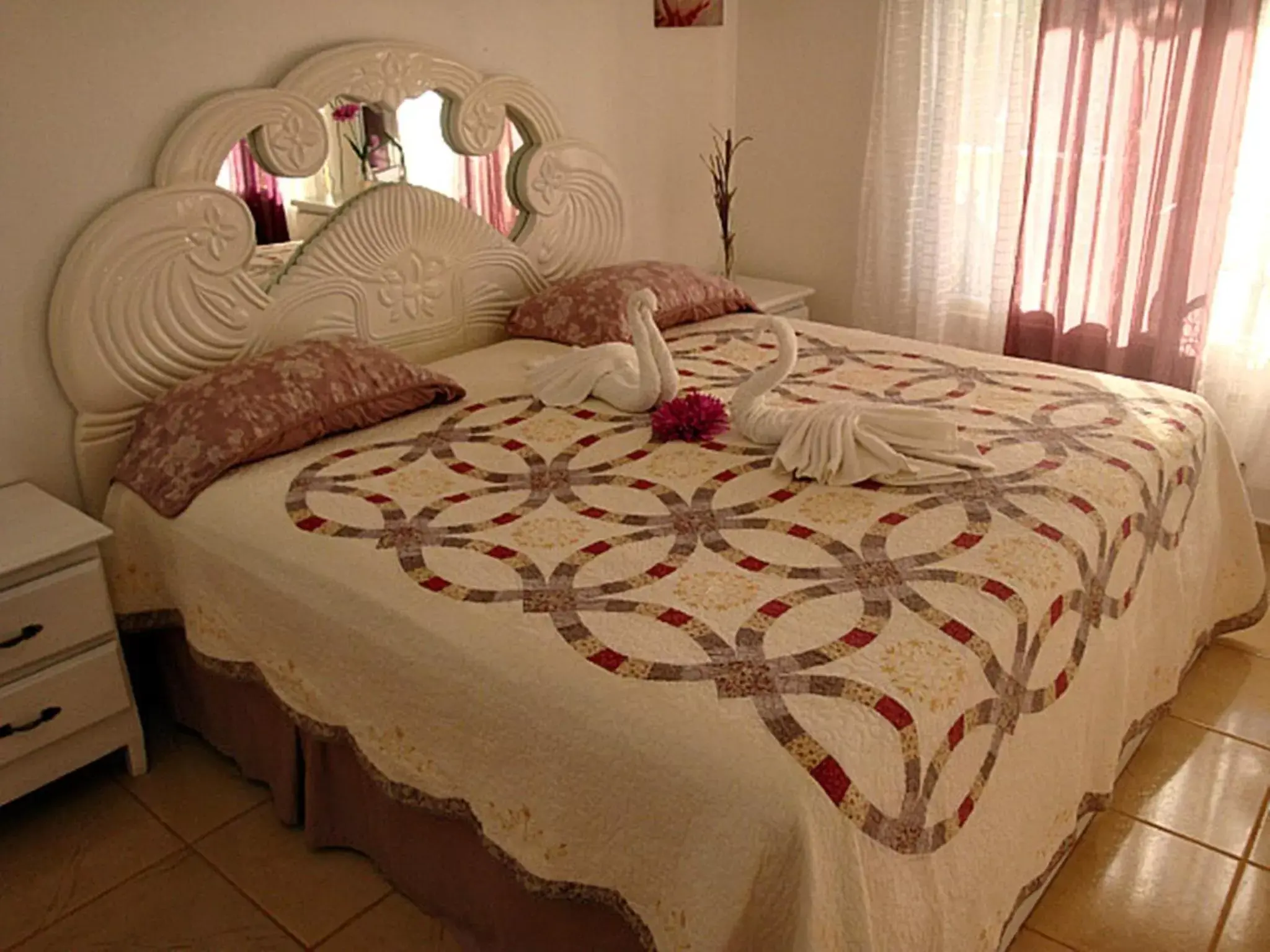Bed in El Malecon B&B Hotel