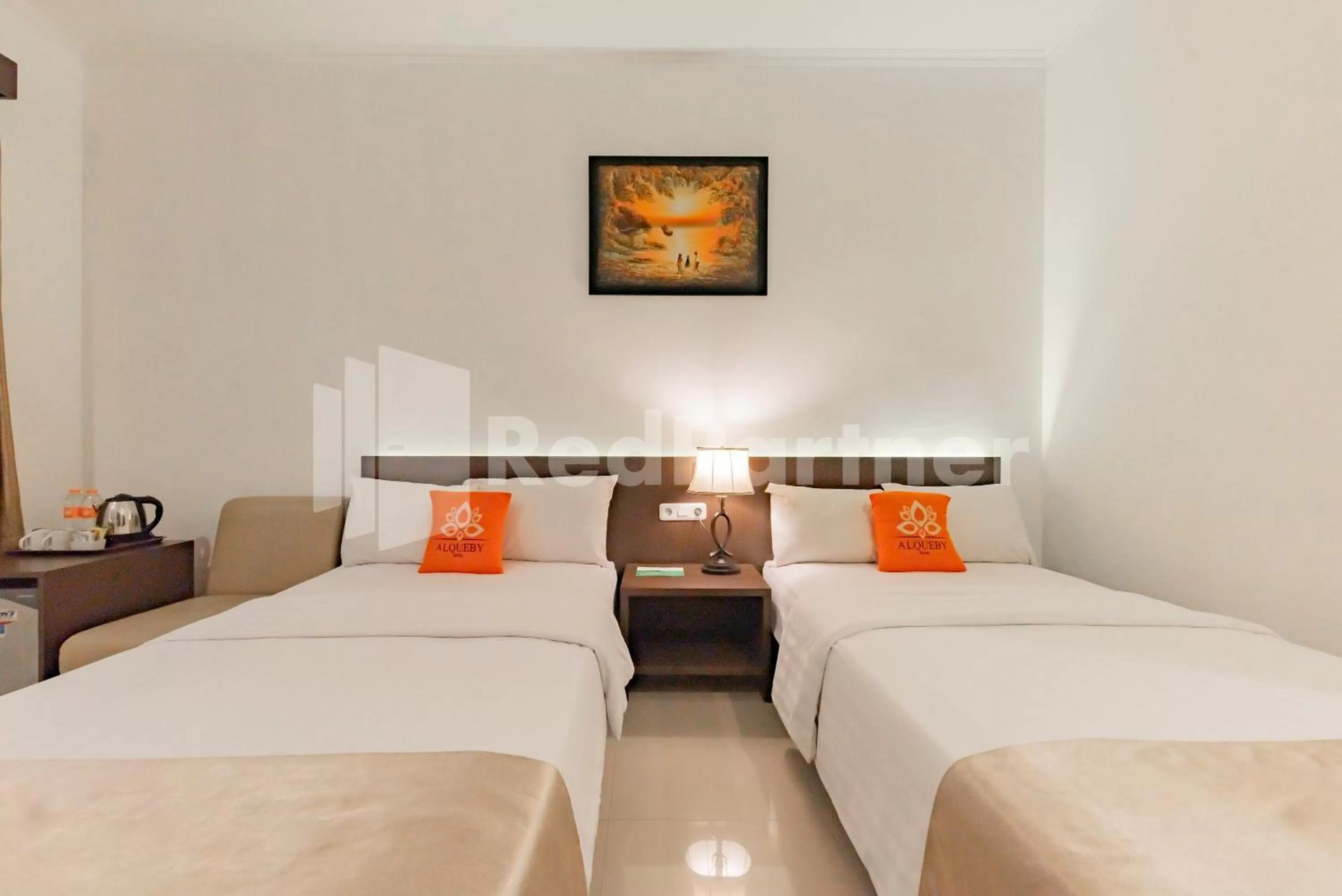 Bedroom, Bed in Alqueby Hotel near Kiara Artha Park & Trans Studio Mall Mitra RedDoorz