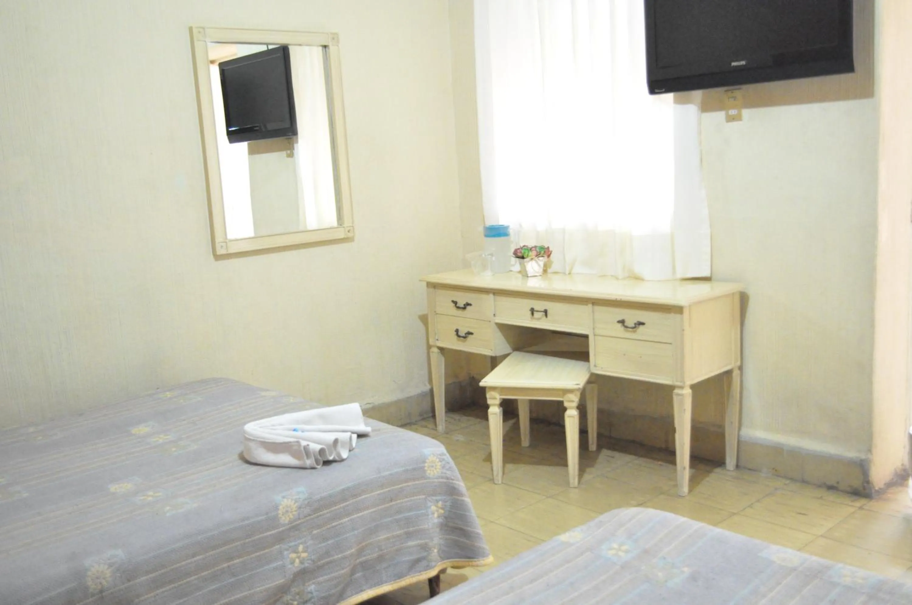 Bed in Hotel Metropolitan I