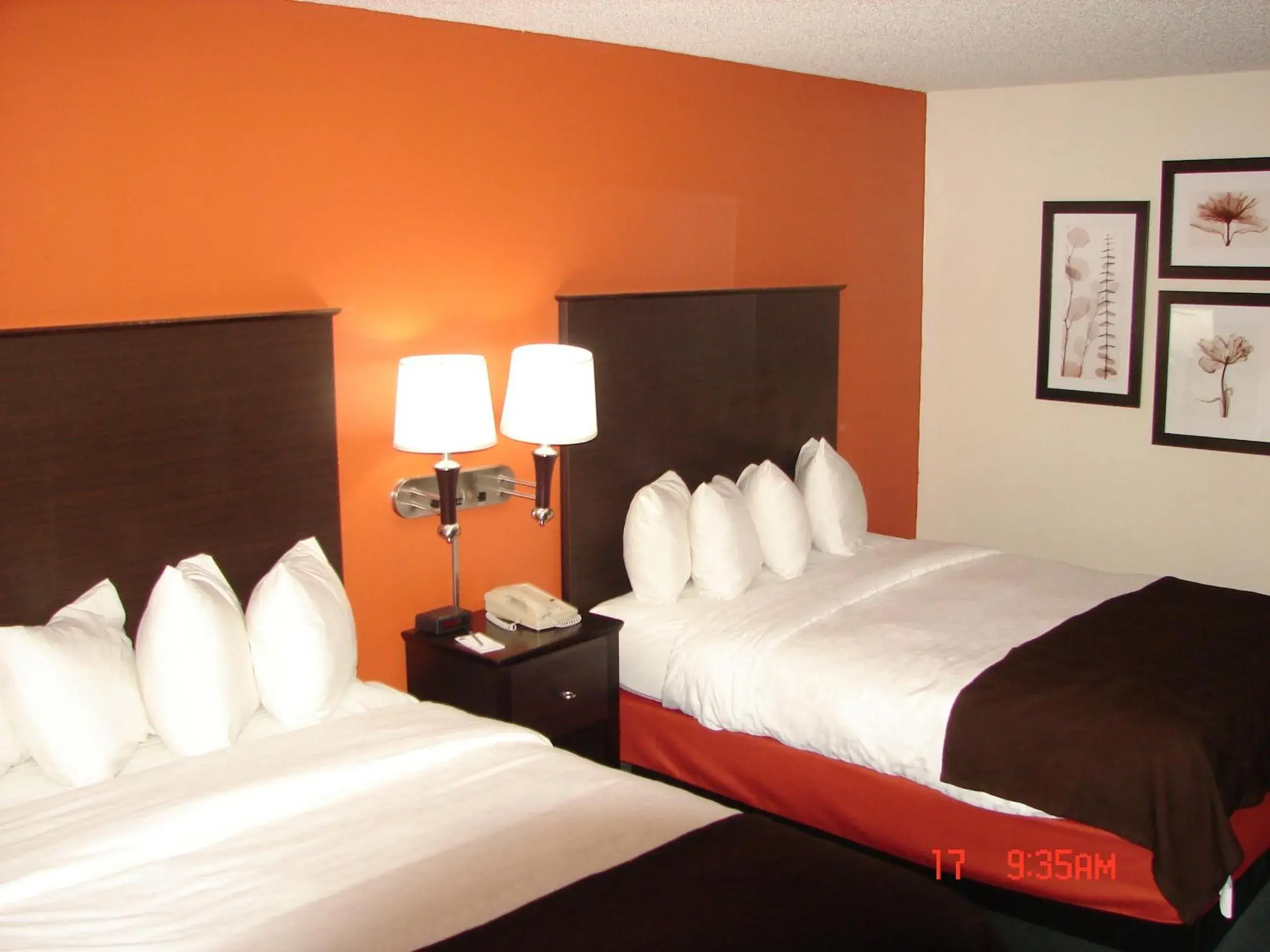 Bed in AmericInn by Wyndham Salina