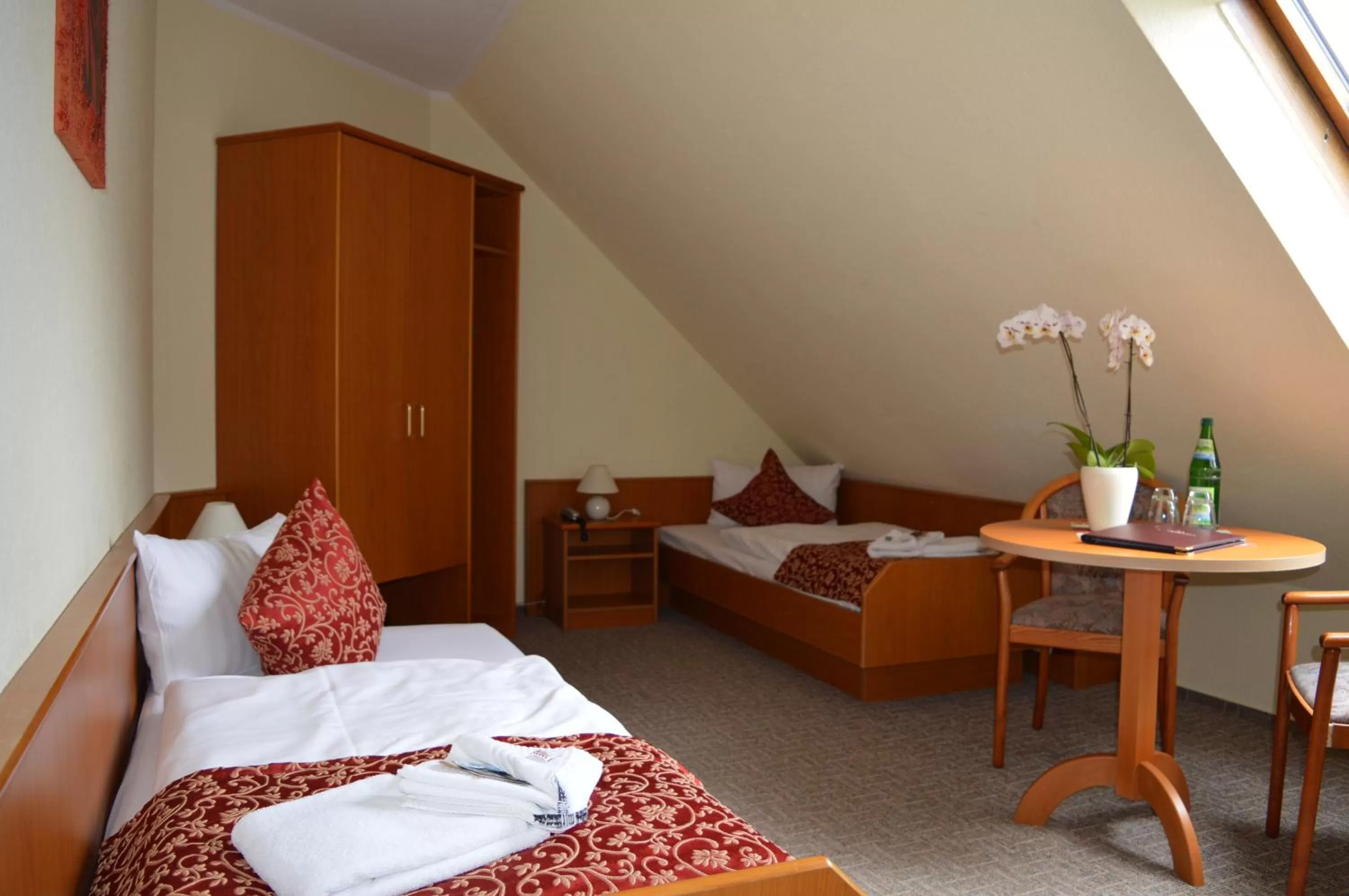 Photo of the whole room, Bed in Hotel Auerhahn