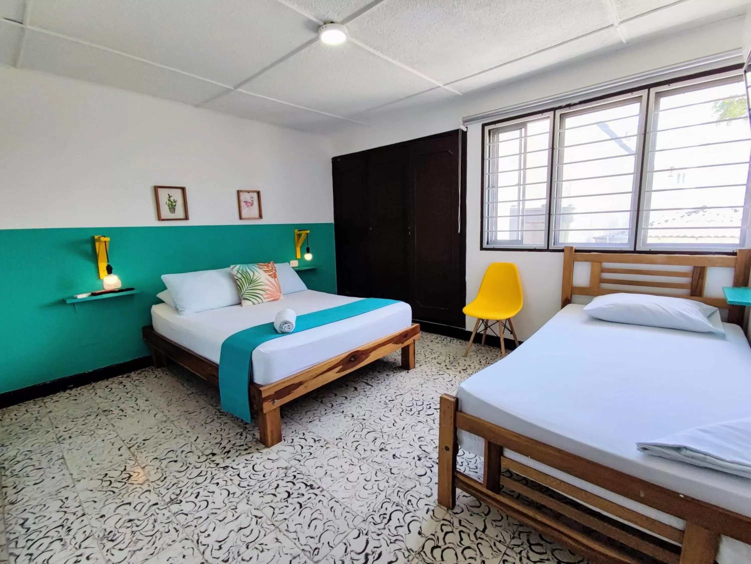 Bed in Bona Vida Hotel