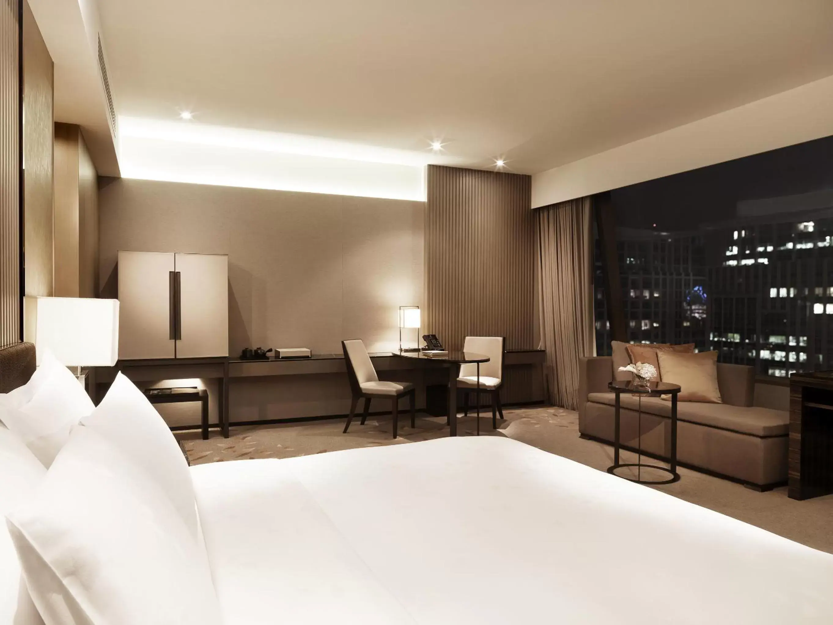 Bed in The Okura Prestige Bangkok
