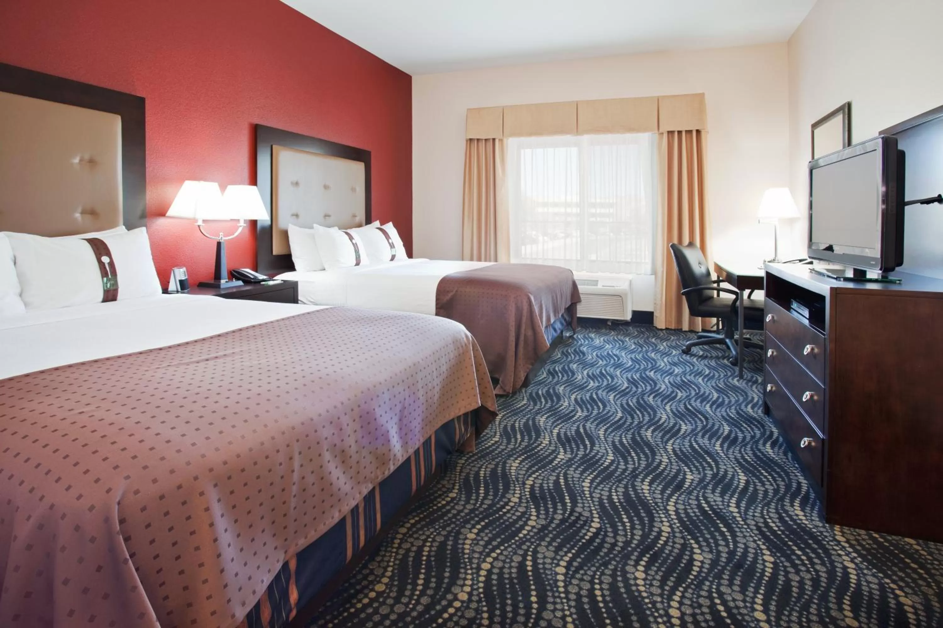 Photo of the whole room, Bed in Holiday Inn Hotel & Suites Grand Junction-Airport by IHG