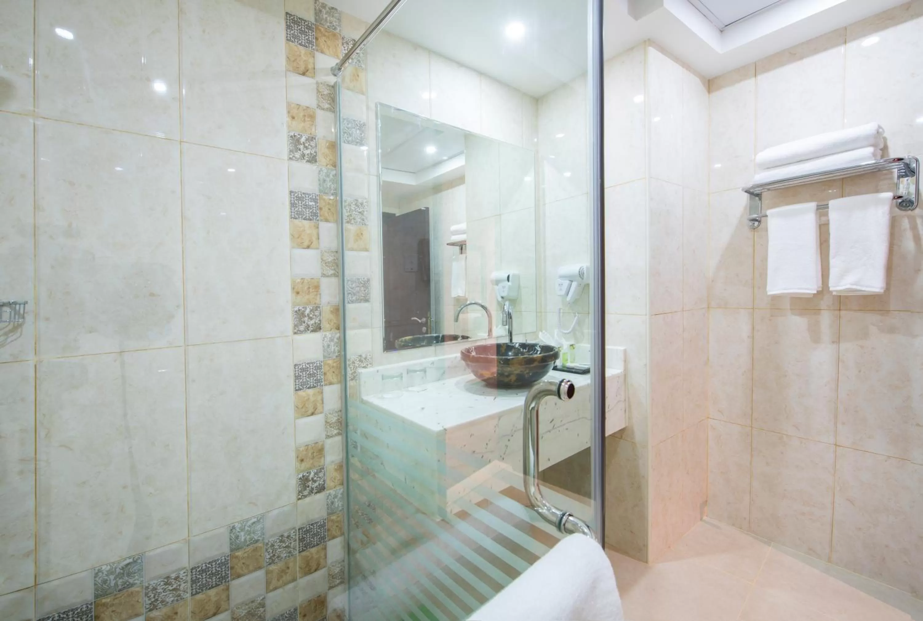 Bathroom in Royal Tulip Hotel LLC