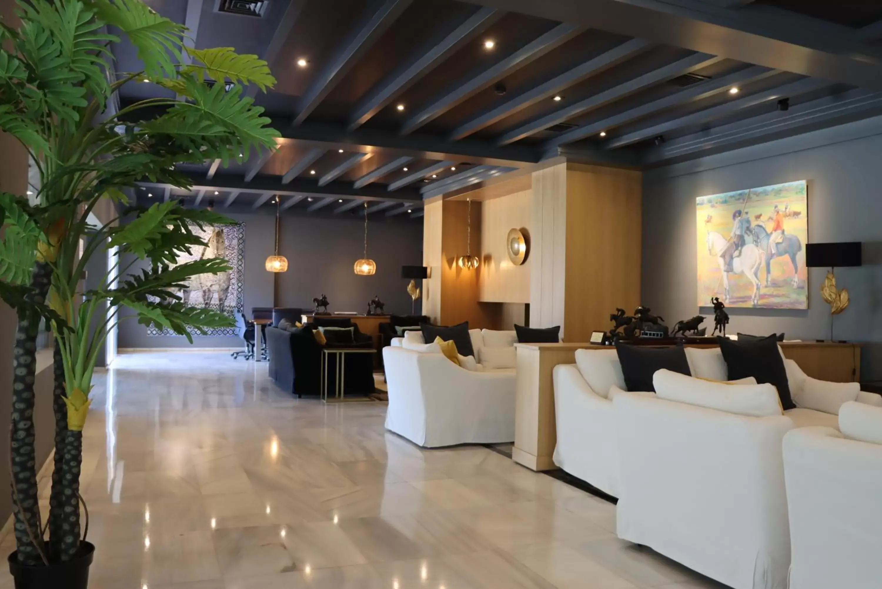Communal lounge/ TV room in Hotel Jerez & Spa