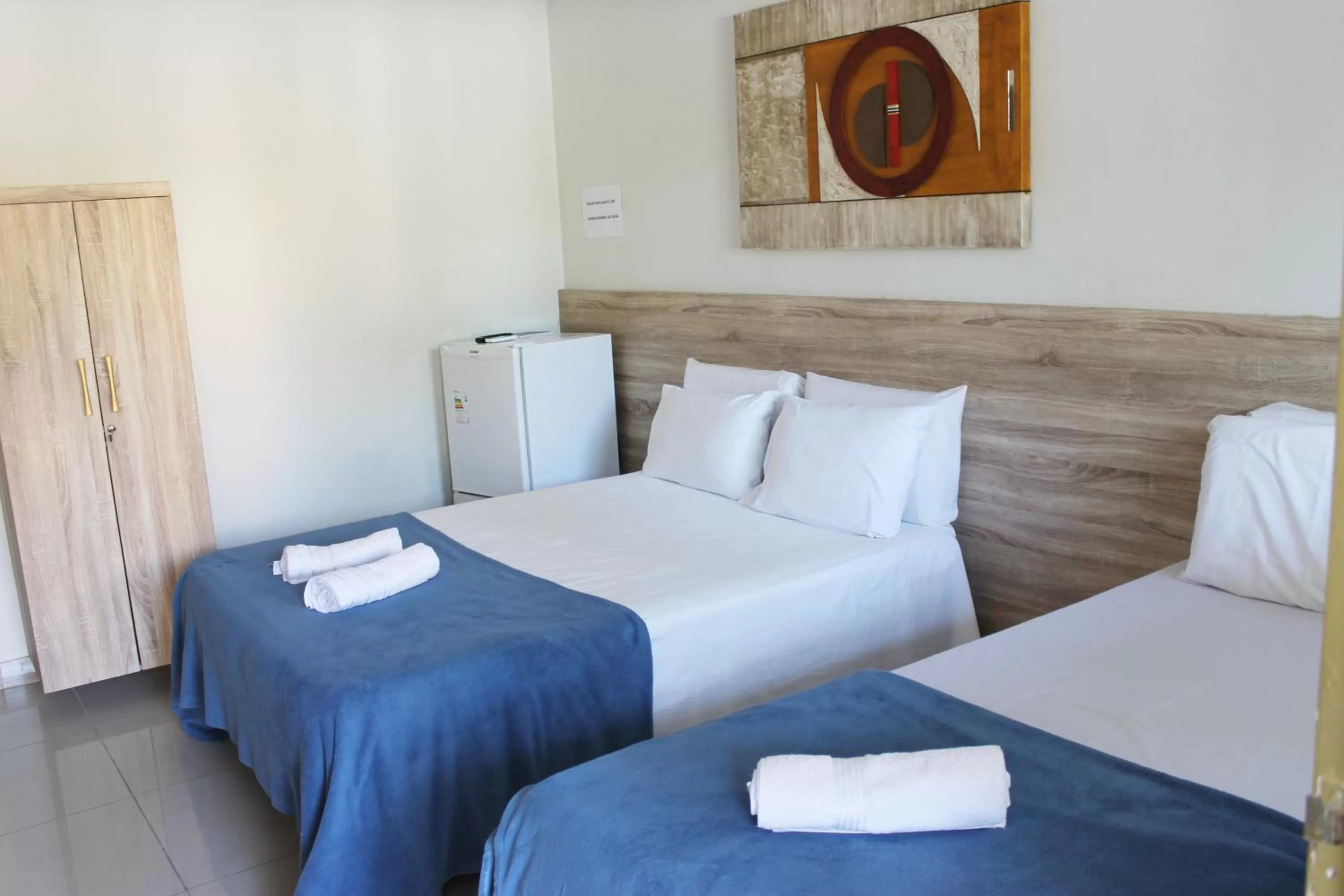 Bed in Pousada Das Palmeiras