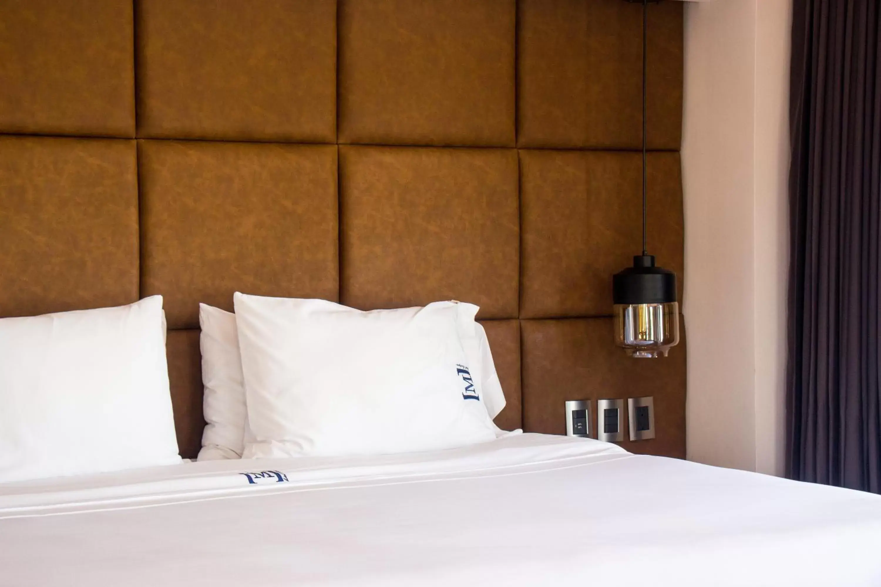 Bed in Maja Hotel Boutique