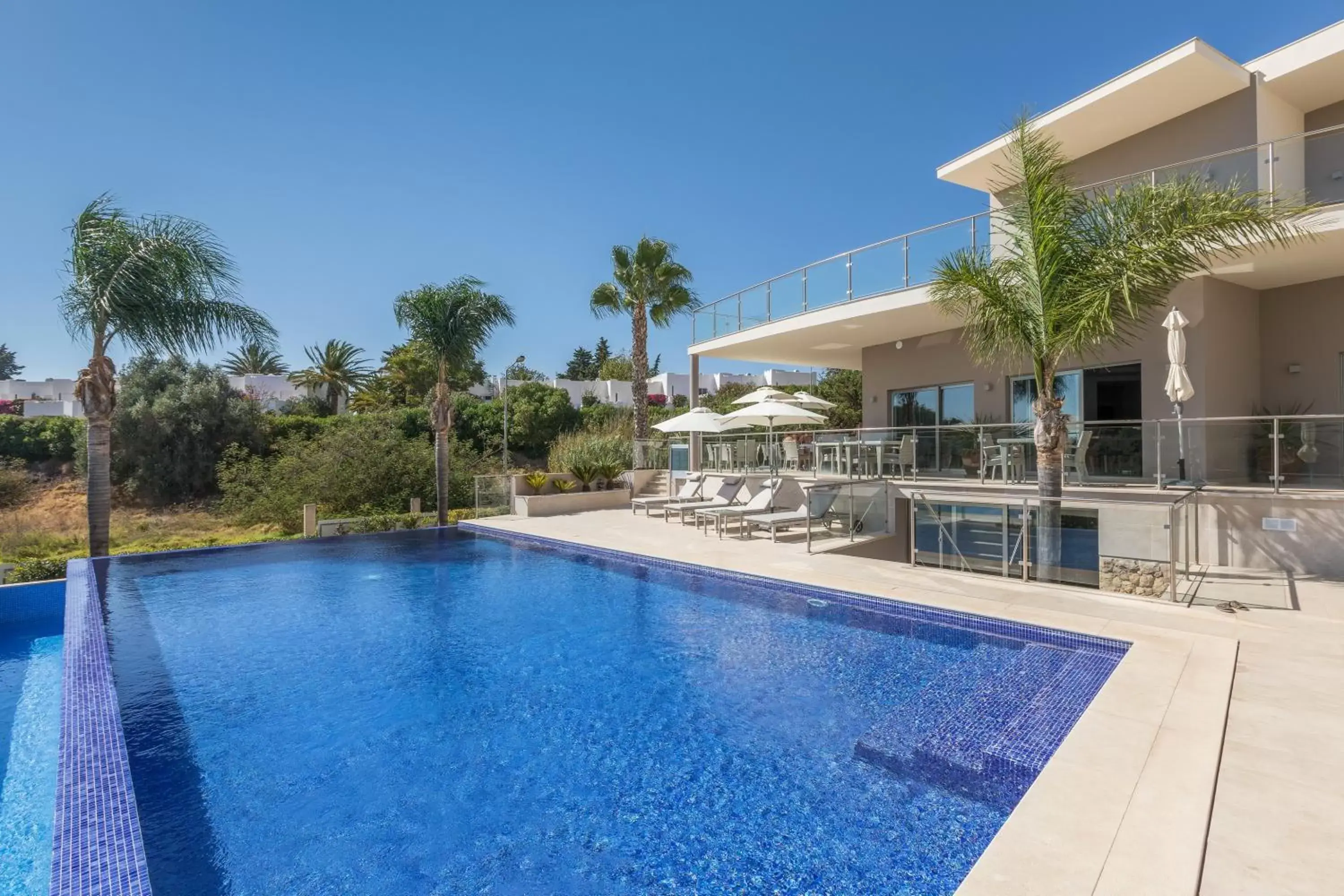 Swimming Pool in Caneiros Luxury House & Suites