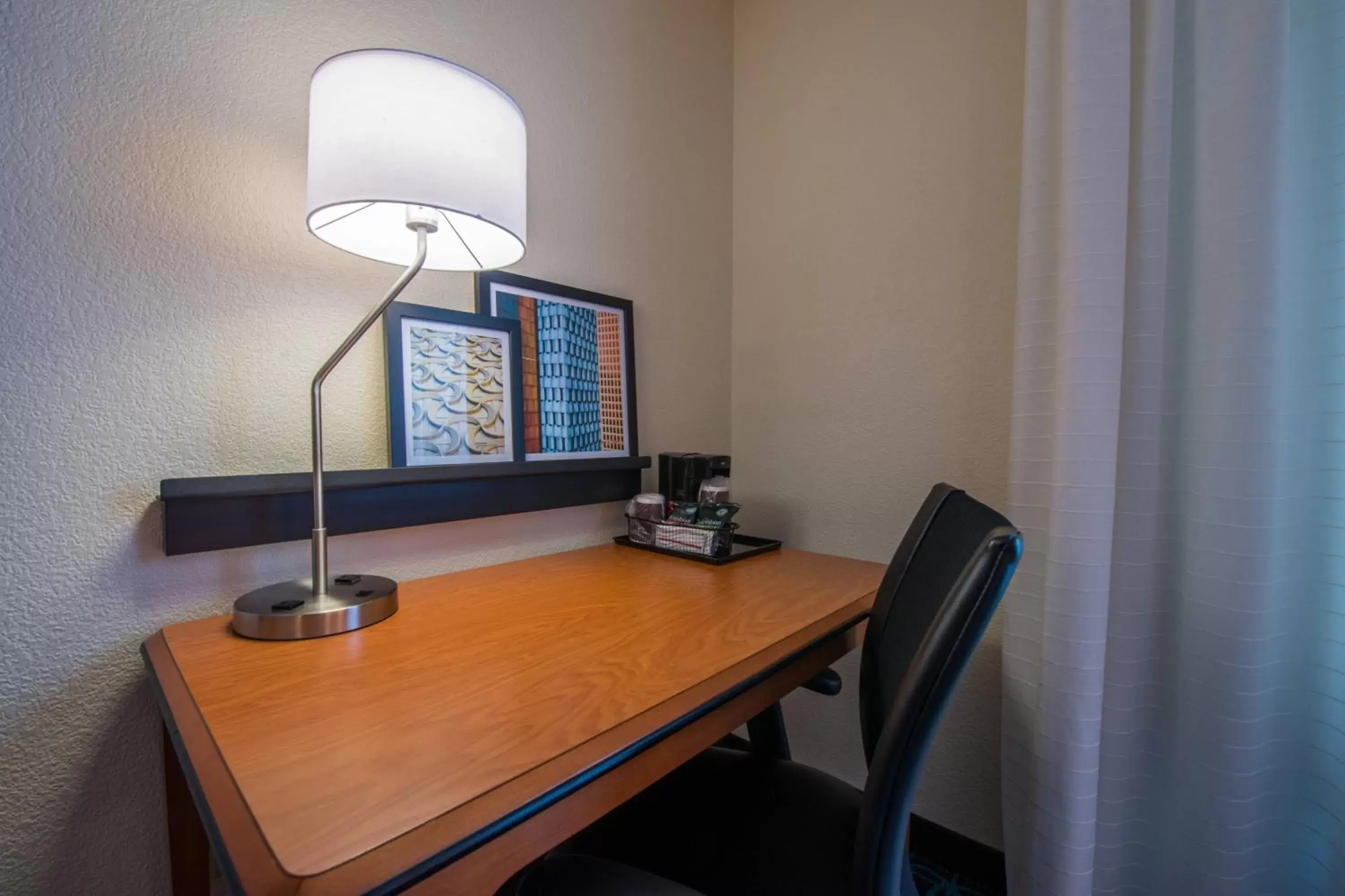 Photo of the whole room, TV/Entertainment Center in Fairfield Inn & Suites Dallas Lewisville