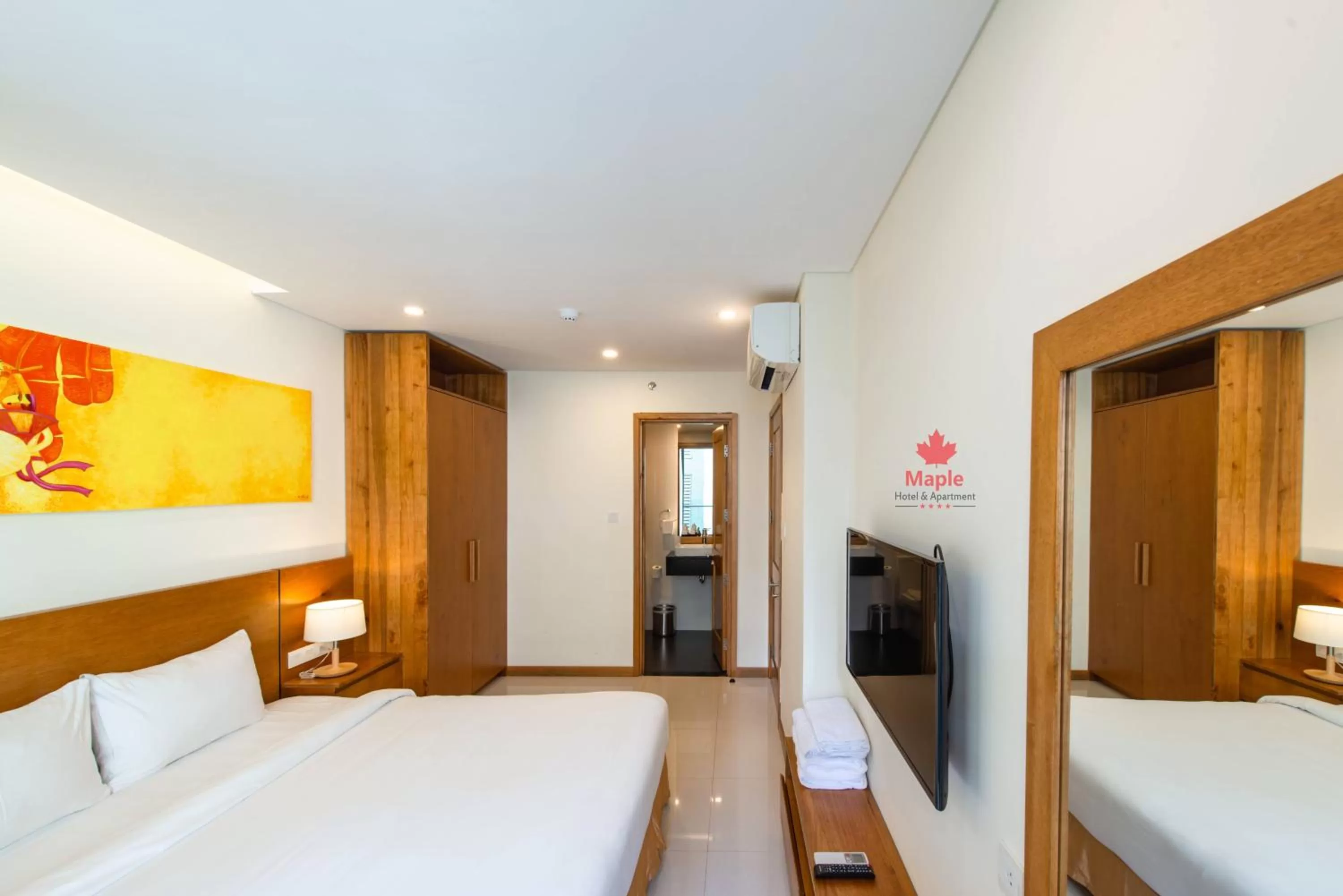 Bed in Maple Hotel & Apartment