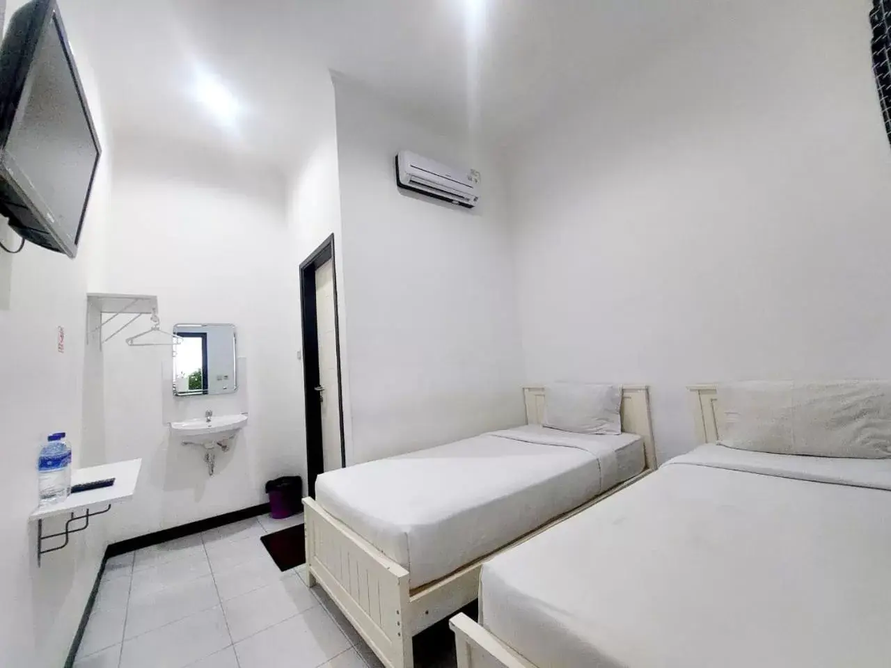 Bed in COZY STAY KUPANG