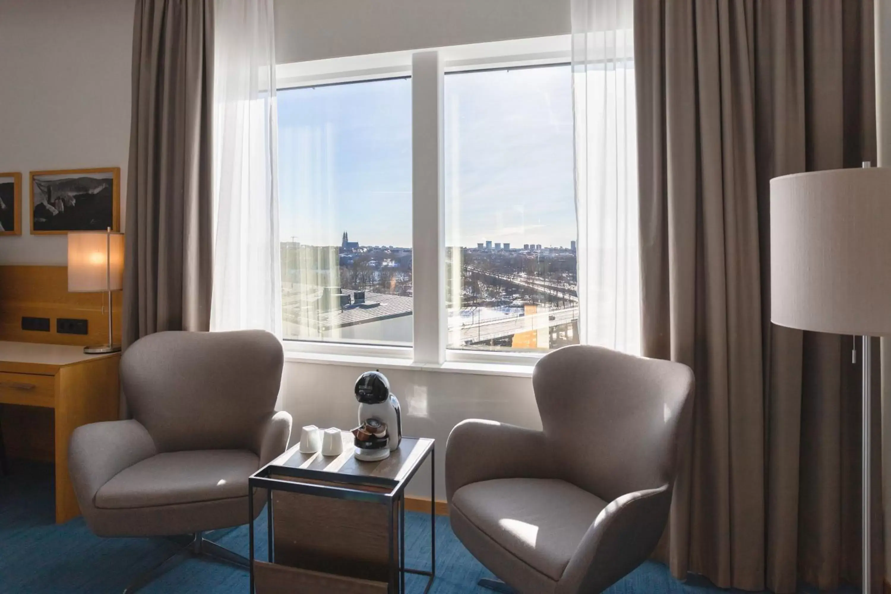 Photo of the whole room, Seating Area in Courtyard by Marriott Stockholm Kungsholmen