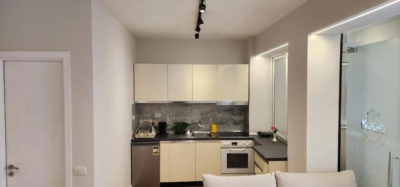 Kitchen or kitchenette in Signature Idea hotel